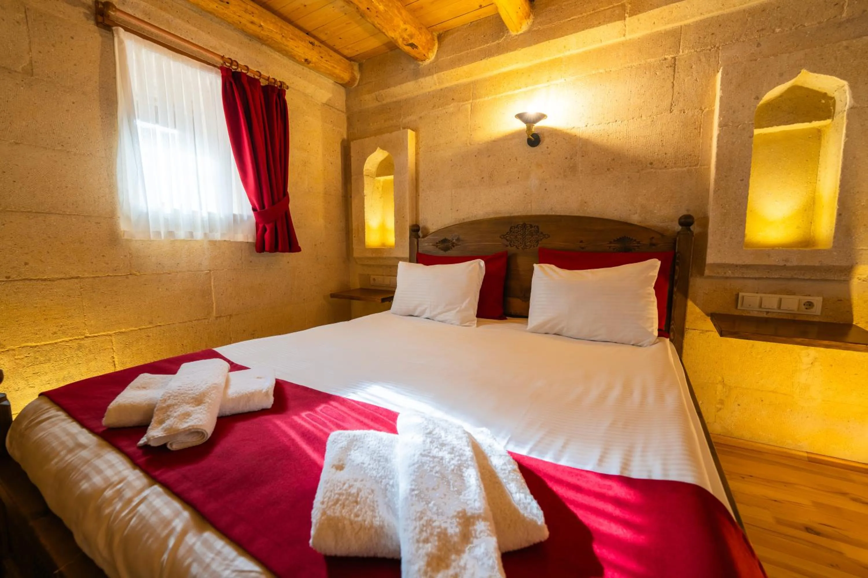 Bed in Asyada Suites Hotel