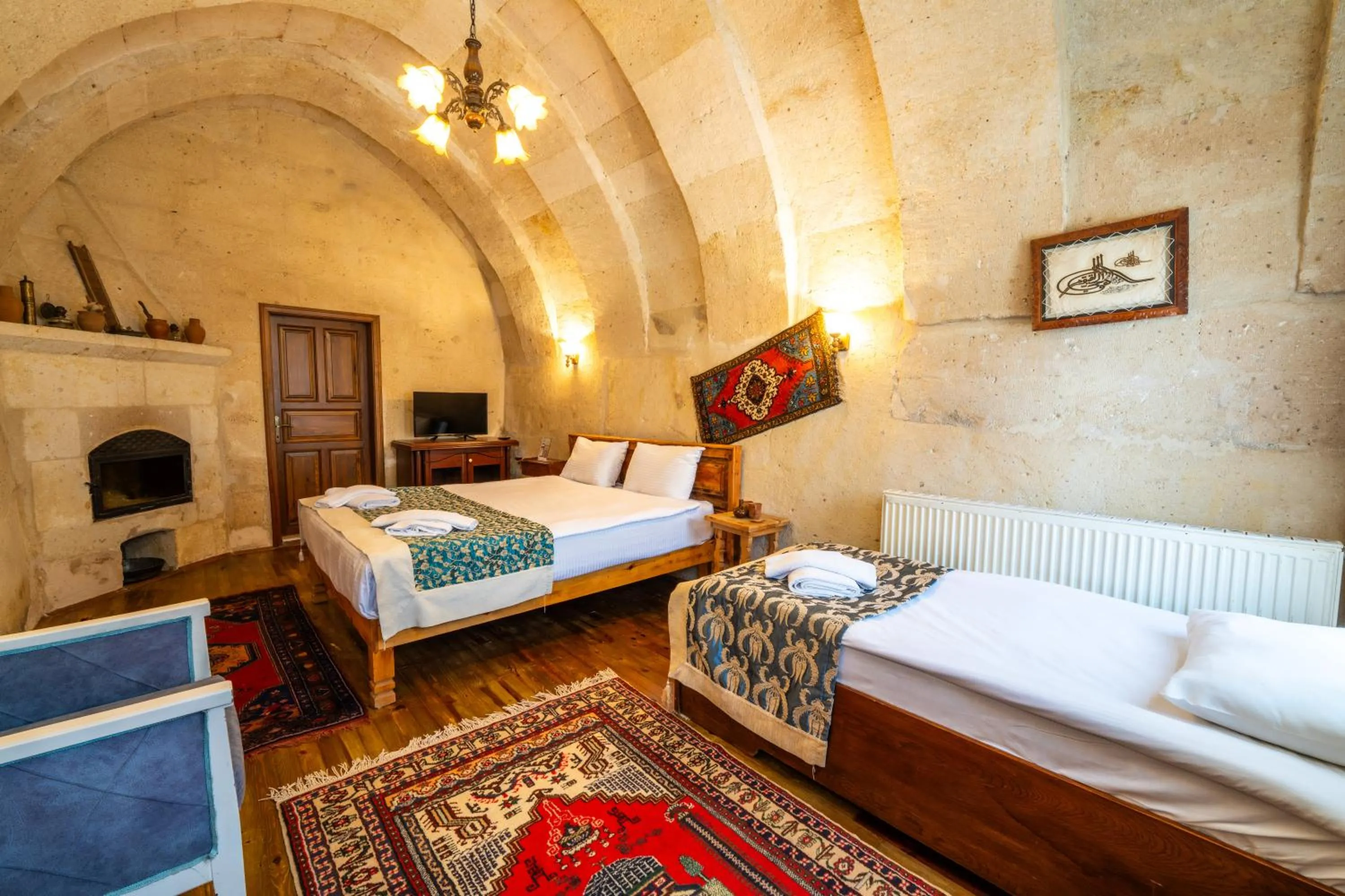 Photo of the whole room, Bed in Asyada Suites Hotel