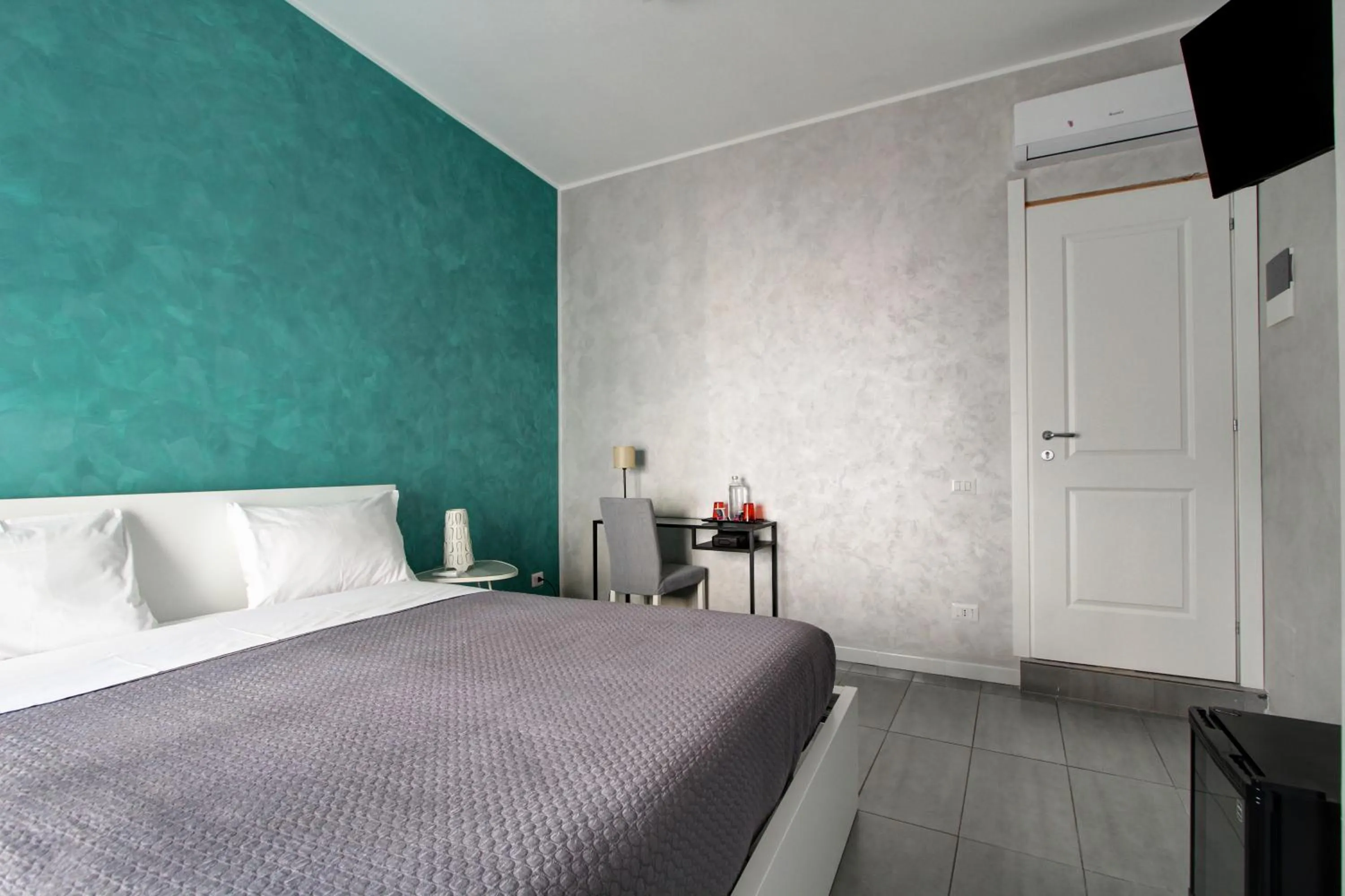 Bed in Vatican Central Suites