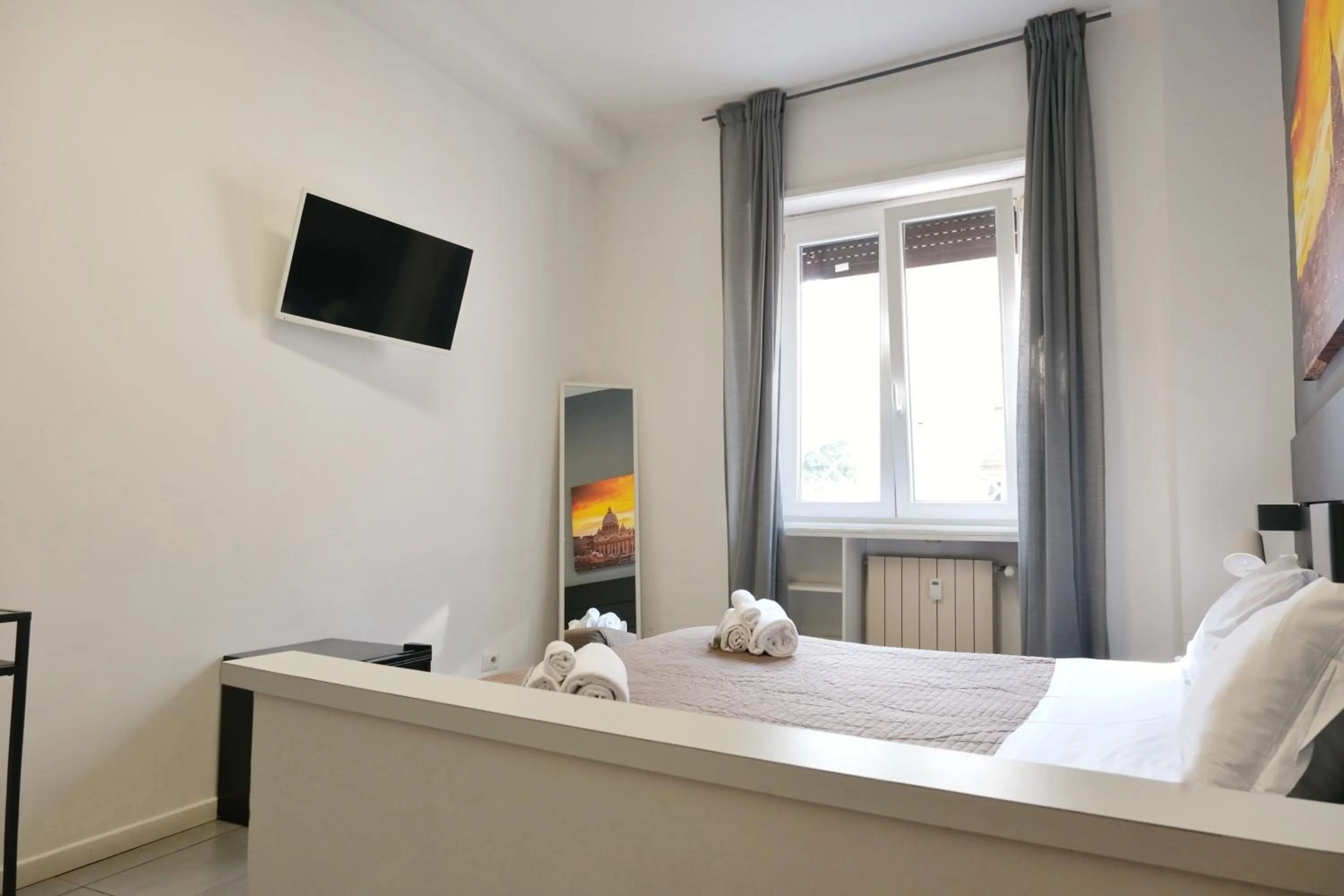 Bed in Vatican Central Suites