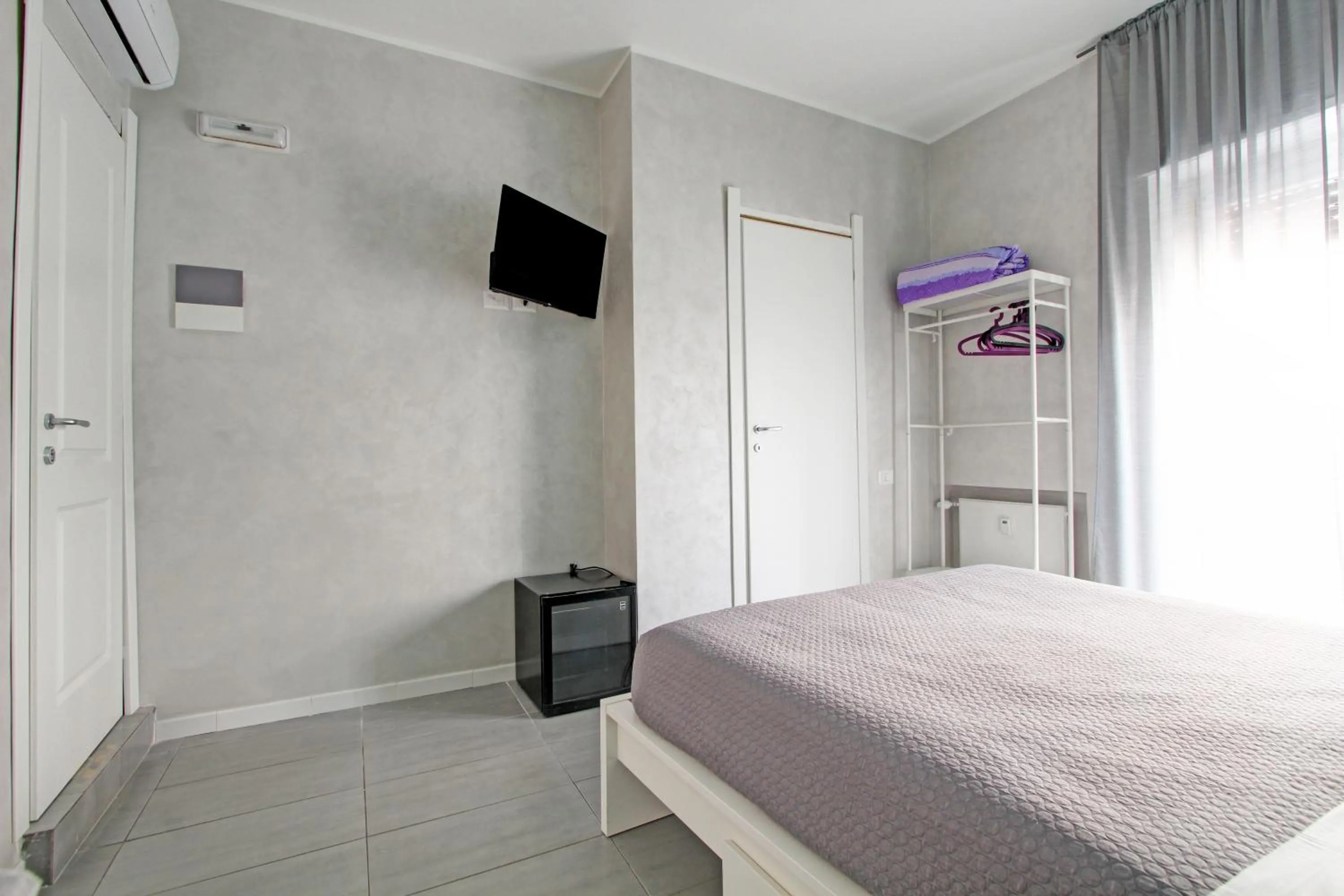 Bed in Vatican Central Suites