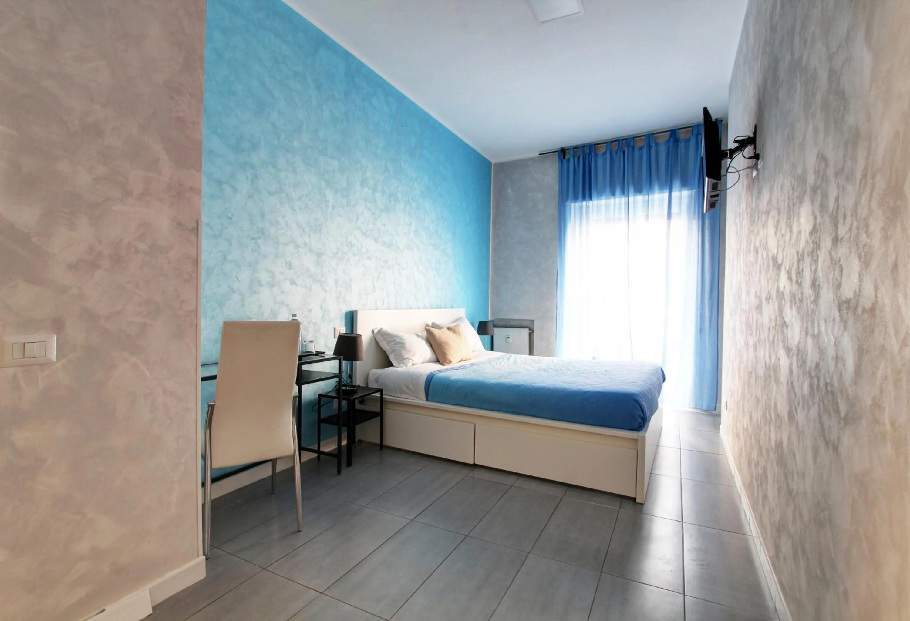 Bed in Vatican Central Suites