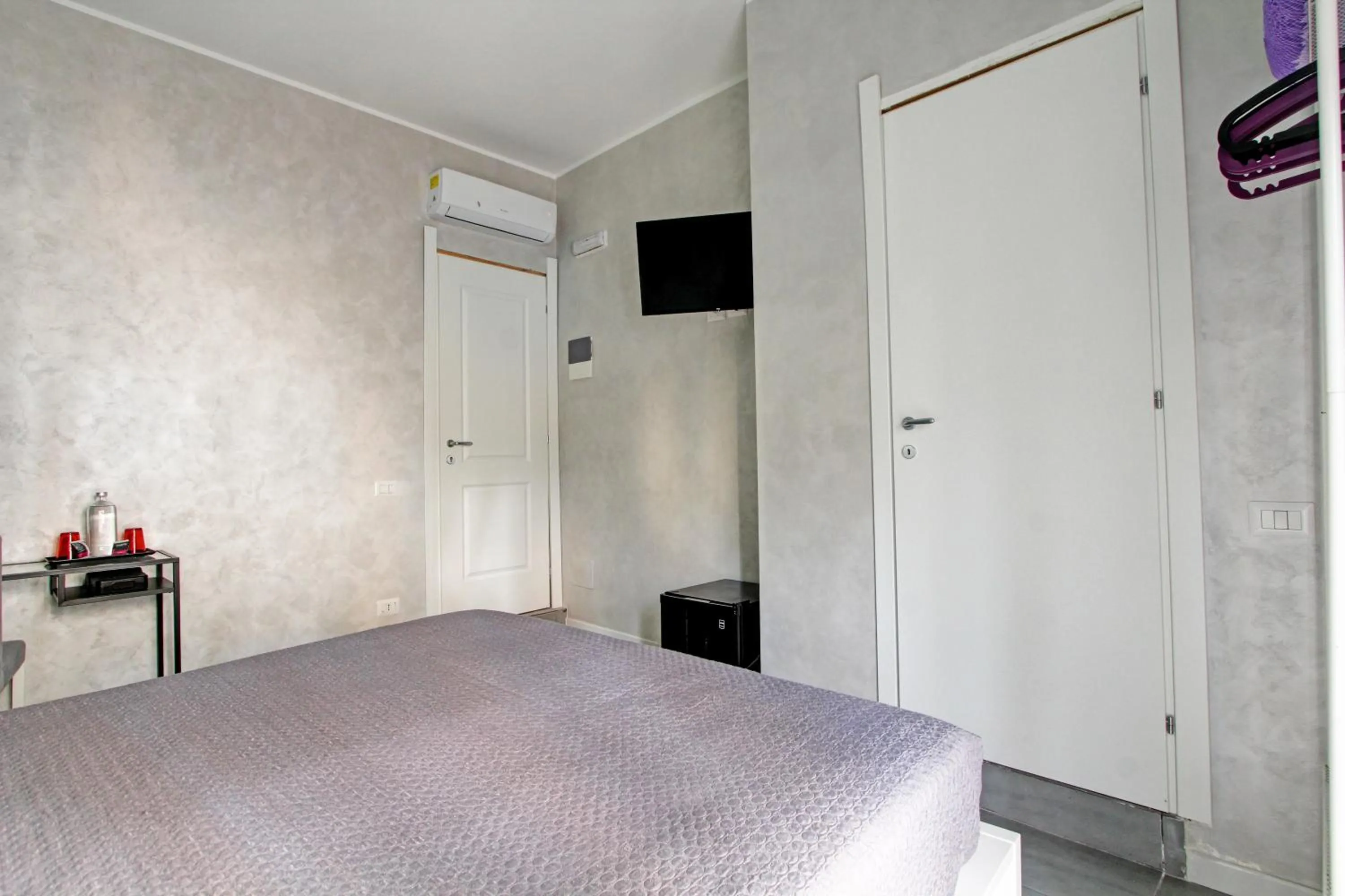 Bed in Vatican Central Suites