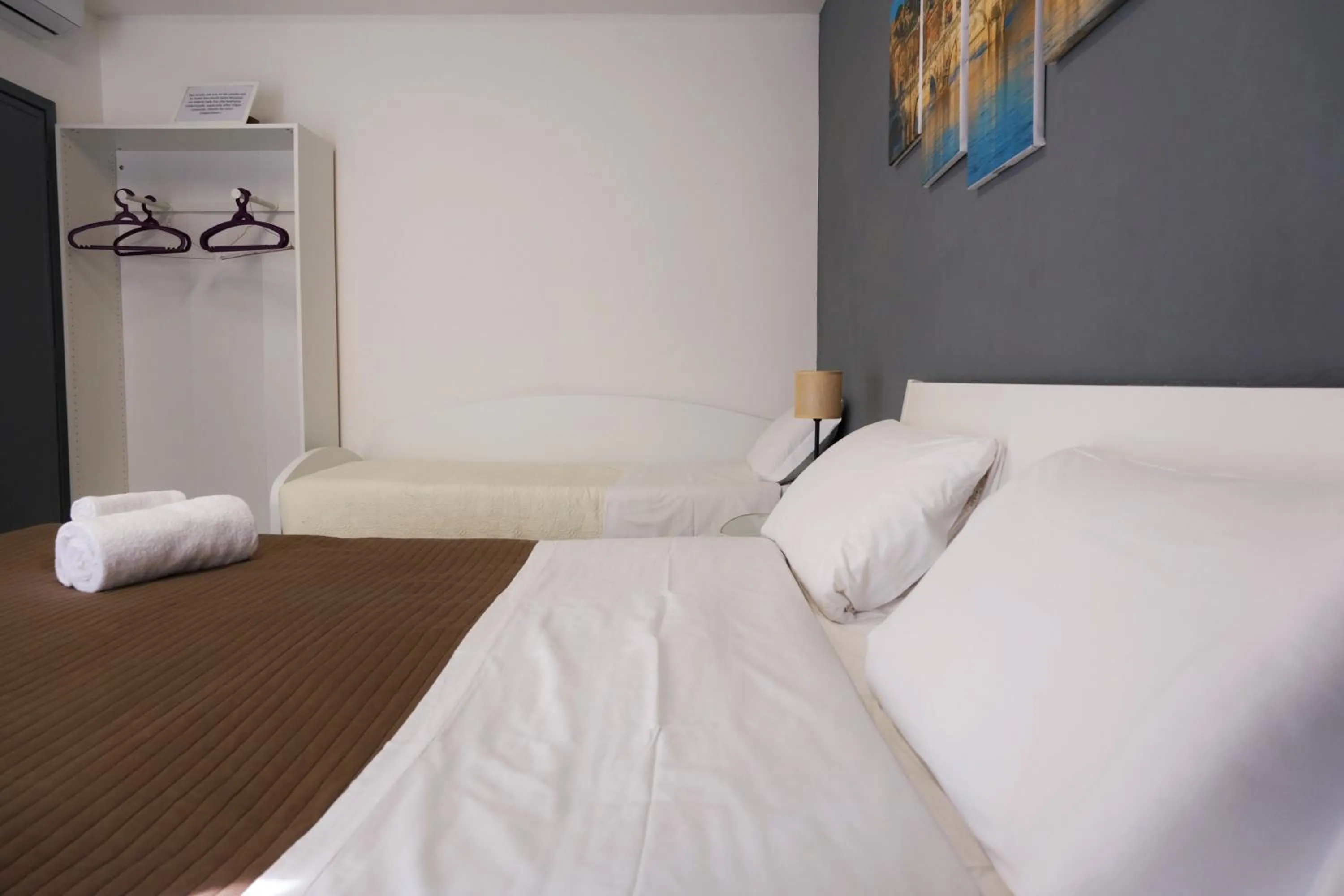 Bed in Vatican Central Suites