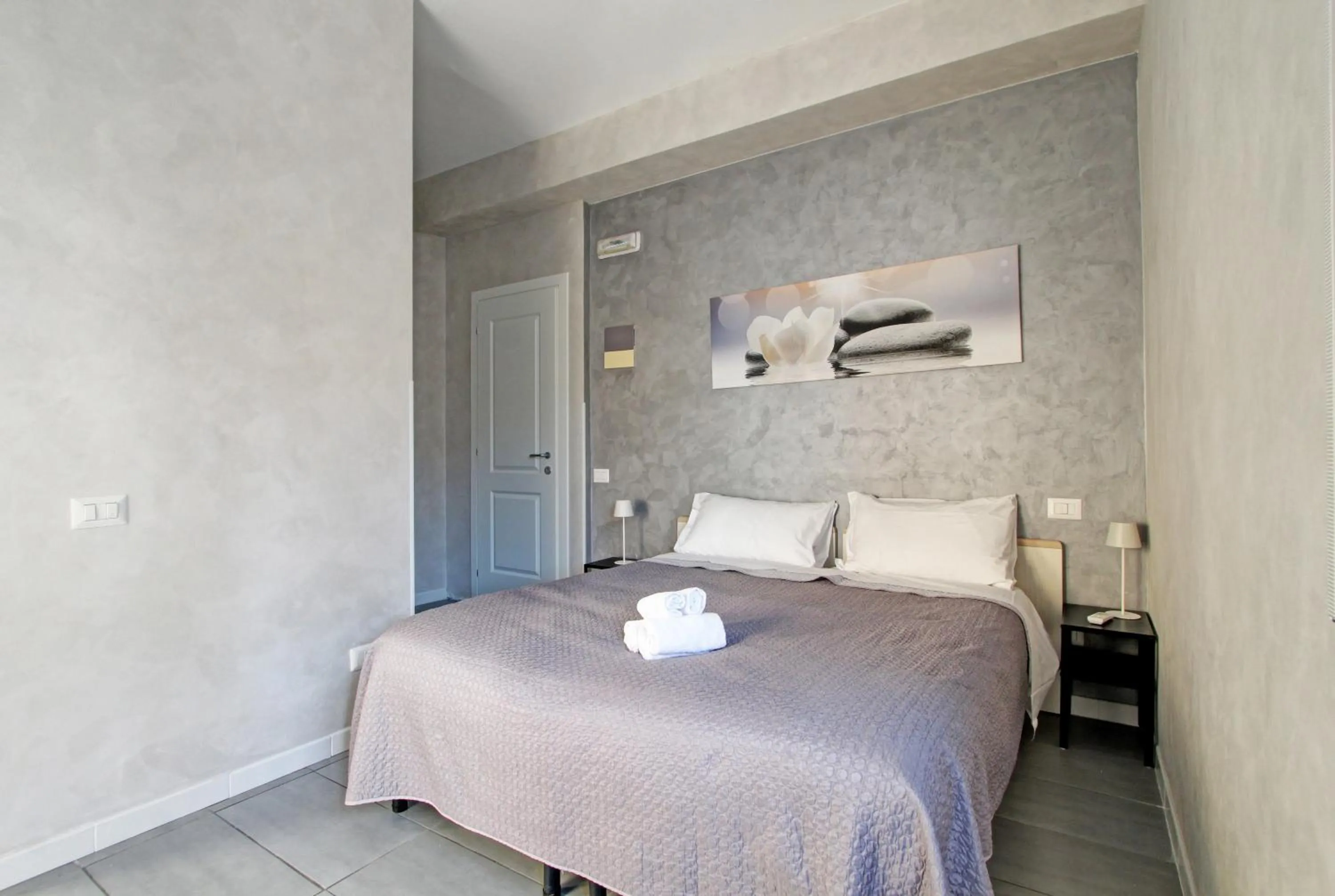 Bed in Vatican Central Suites