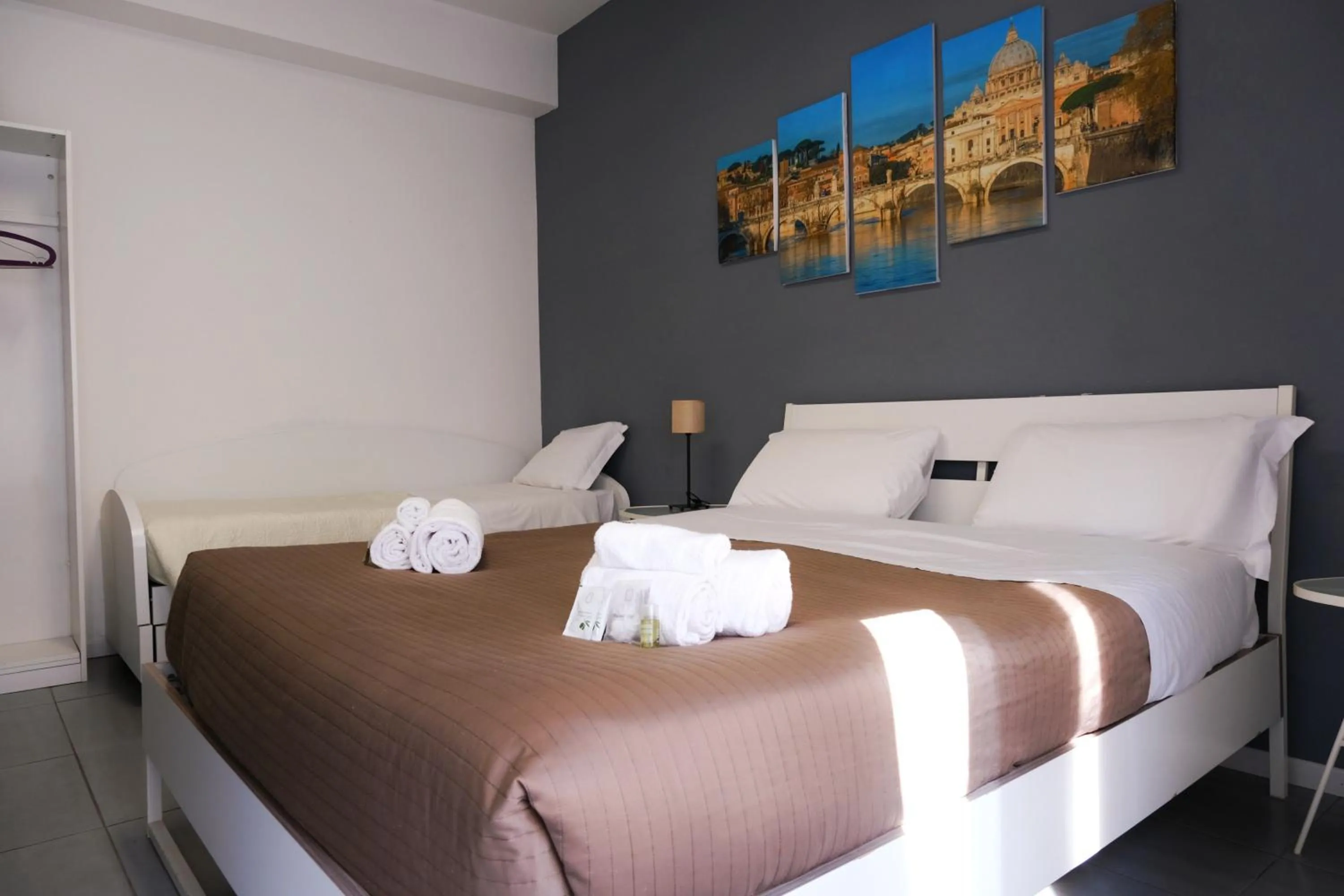 Bed in Vatican Central Suites