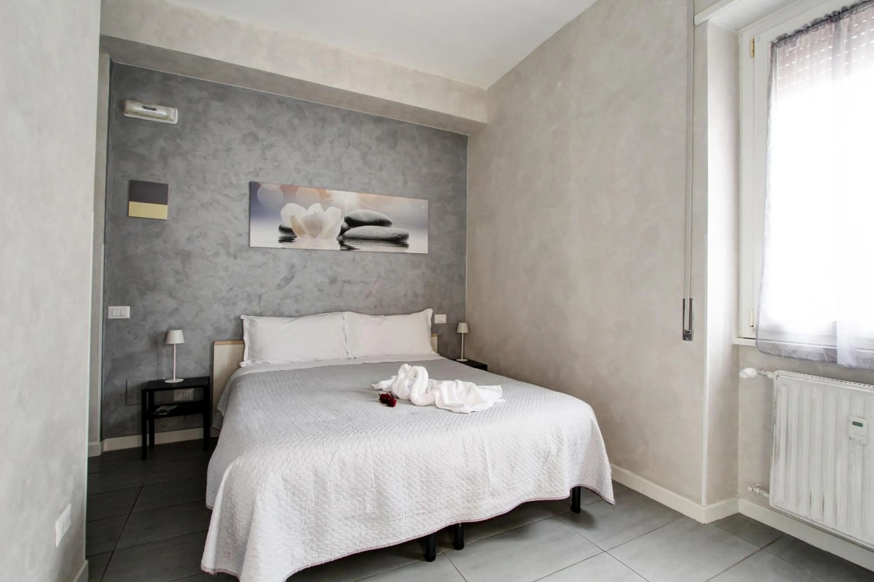 Bed in Vatican Central Suites