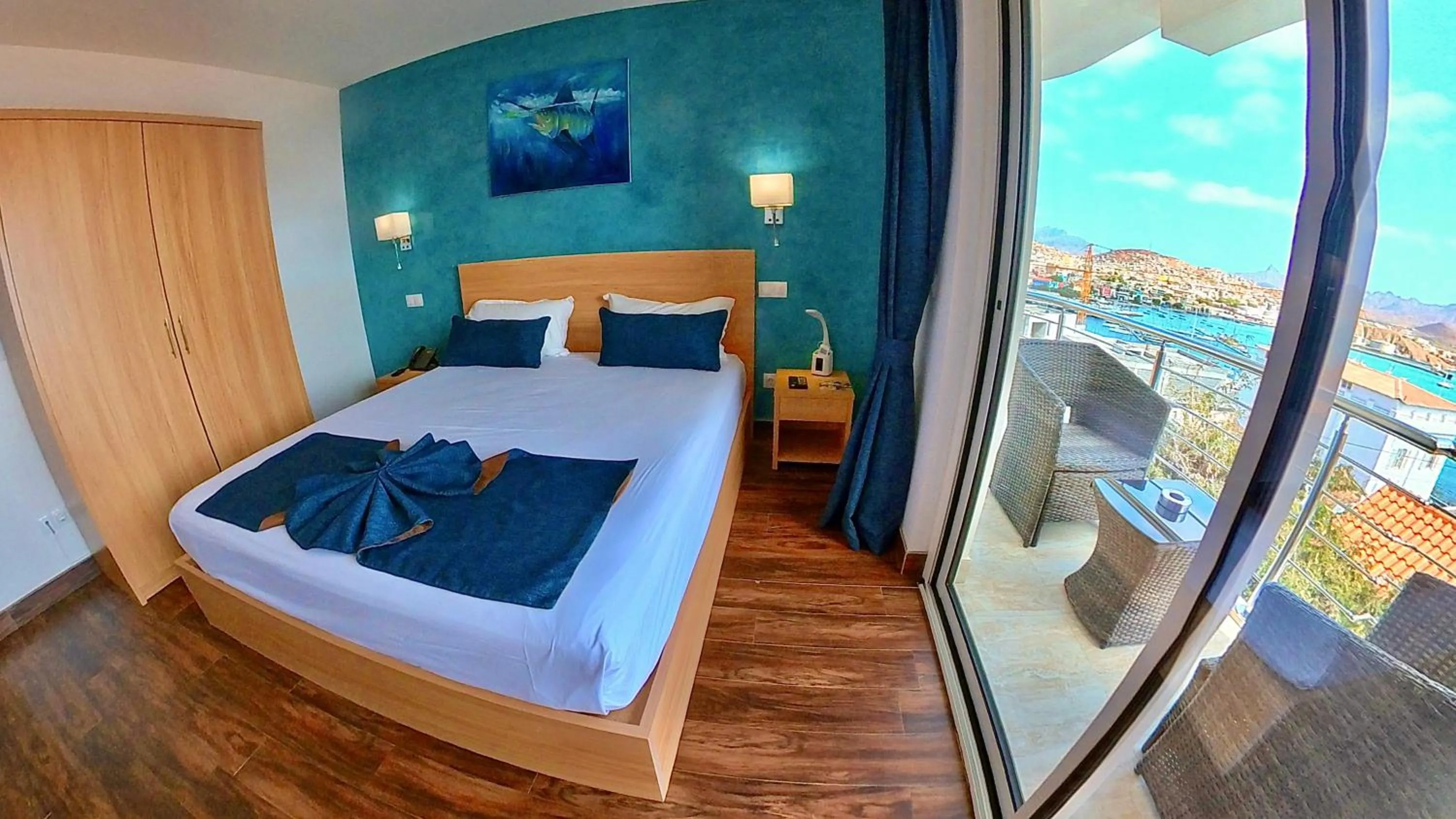 Bed in Blue Marlin Hotel