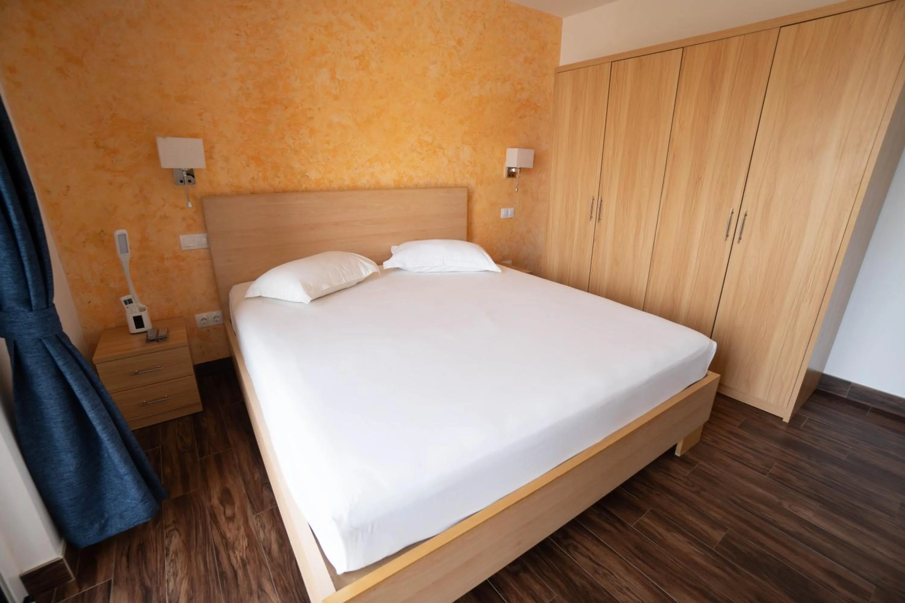 Bed in Blue Marlin Hotel