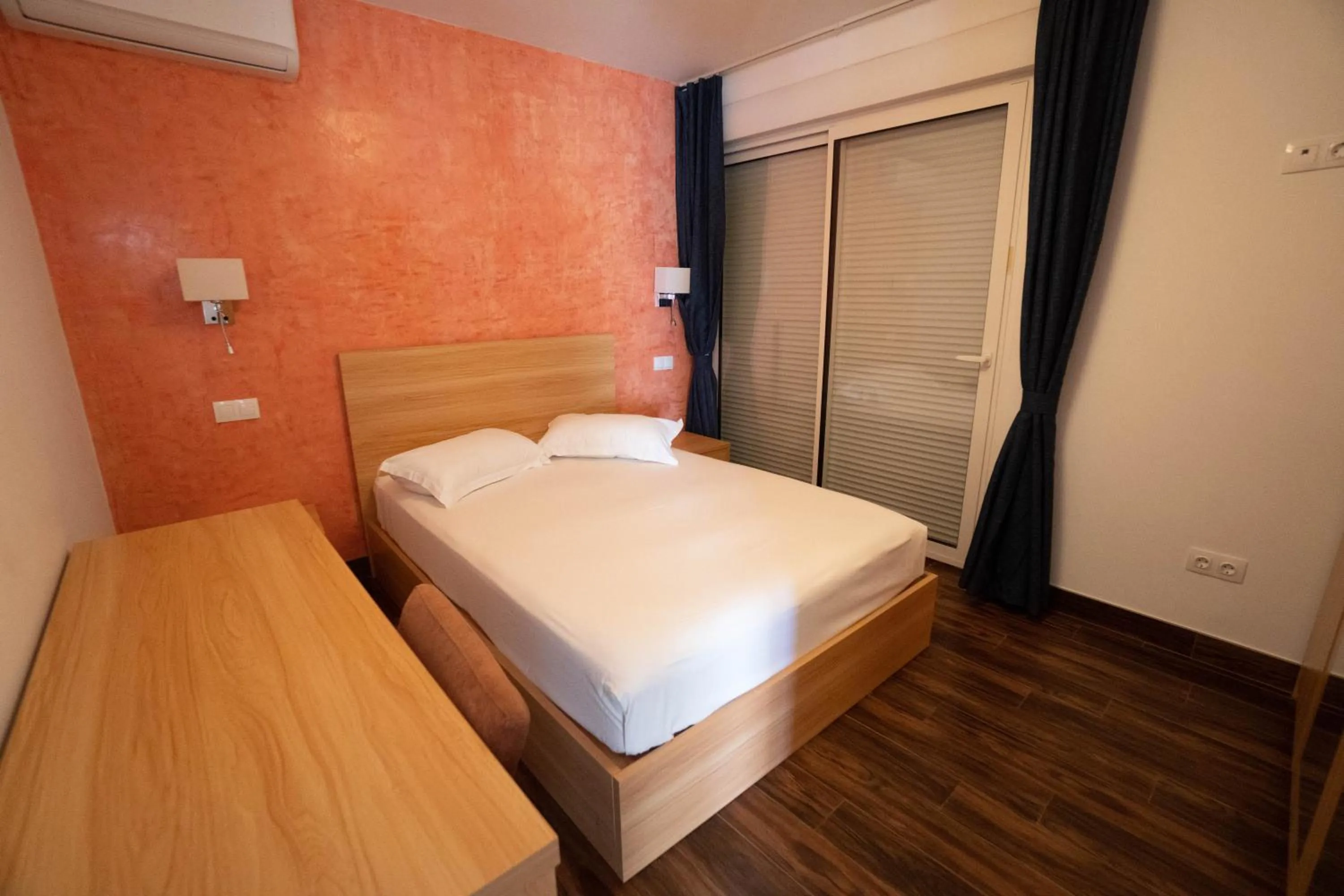 Bed in Blue Marlin Hotel