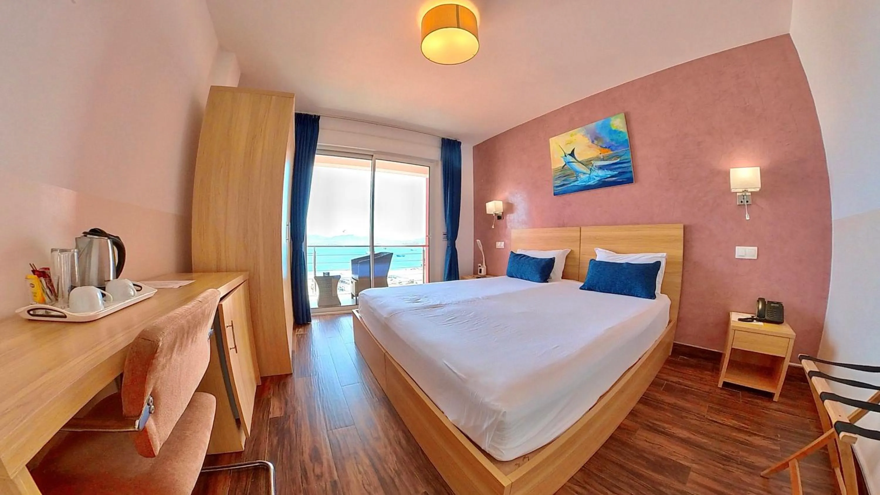 Bed in Blue Marlin Hotel