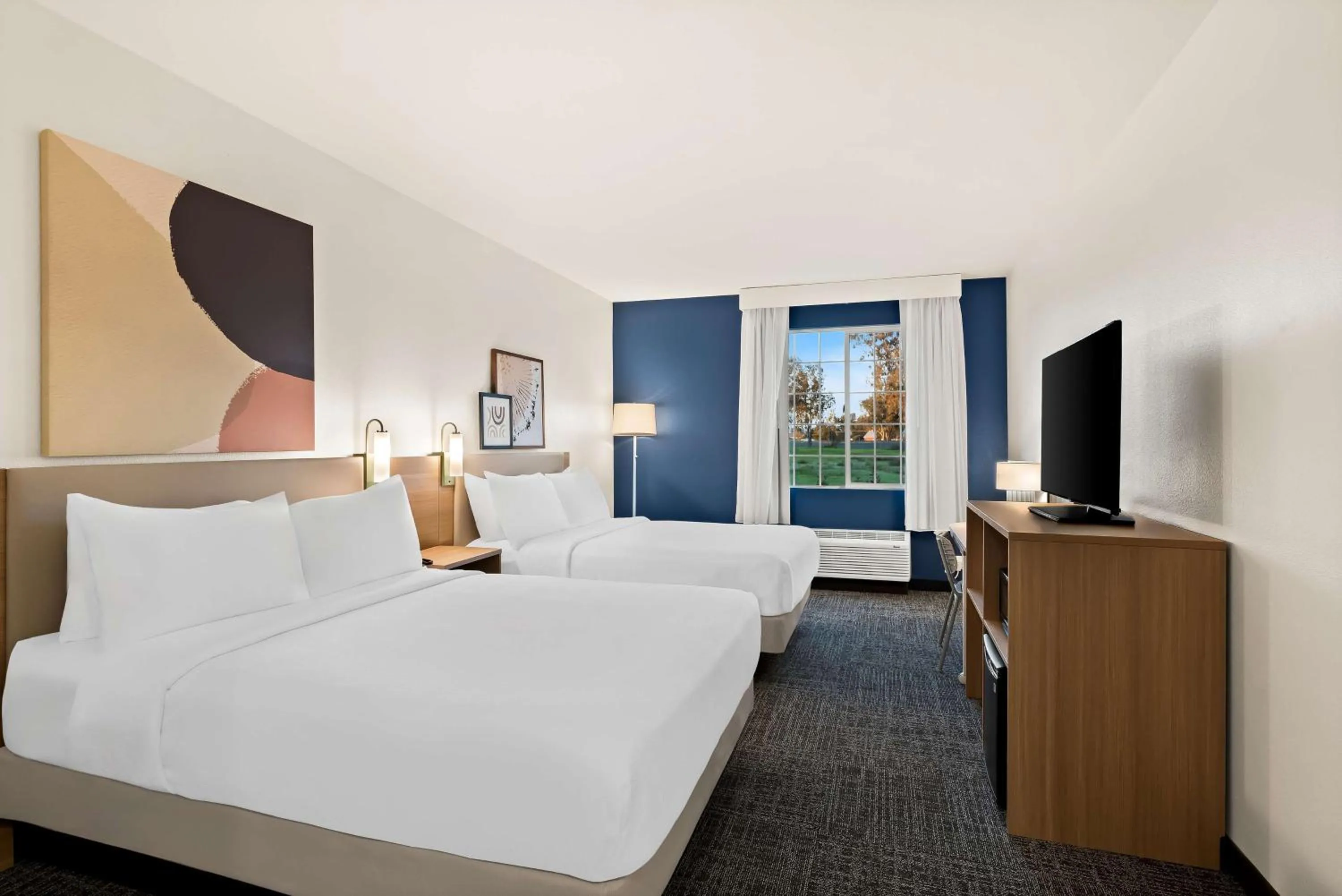 Photo of the whole room, Bed in Spark by Hilton Newest Hotel in Williams CA