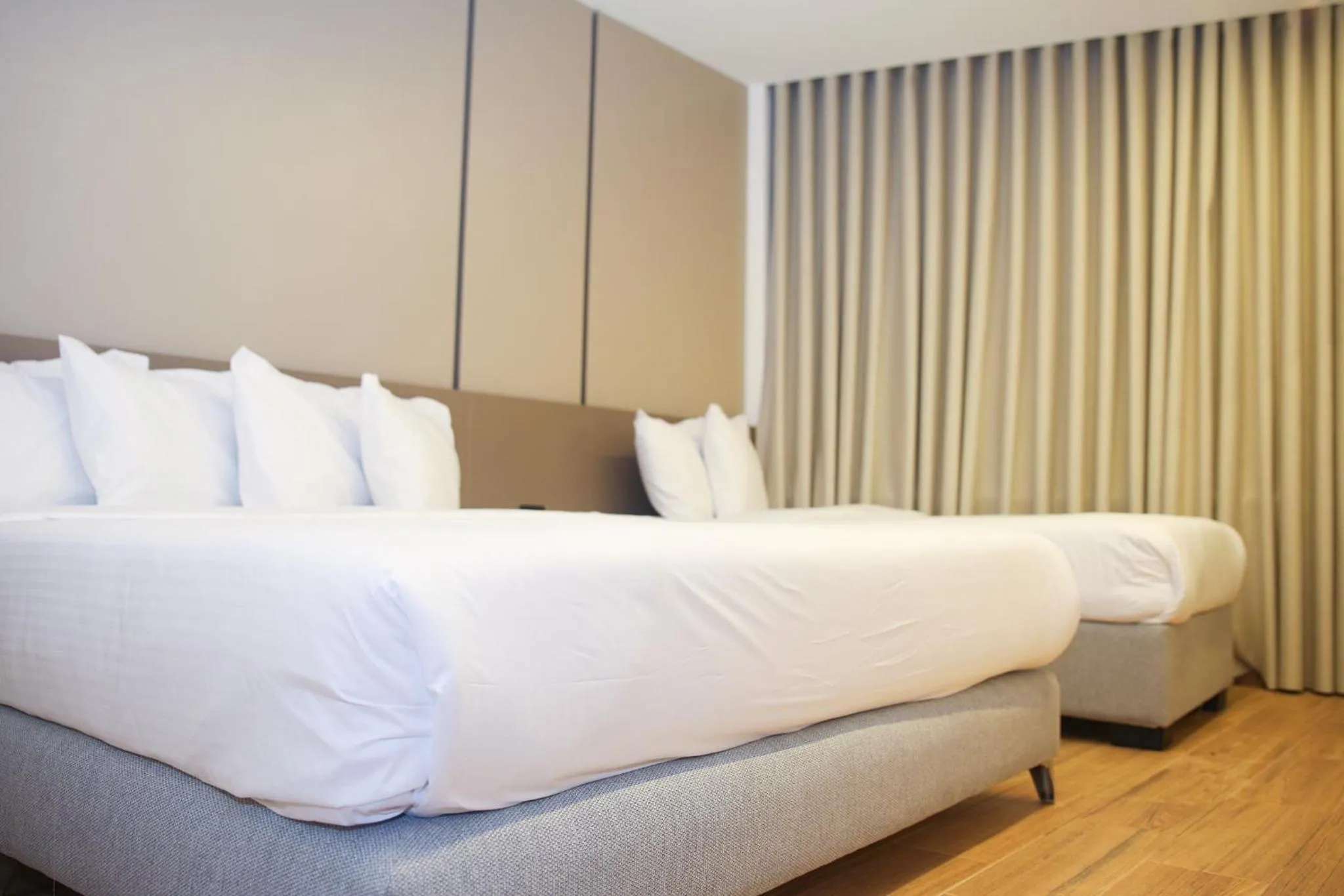 Bed in Spark Plaza Hotel