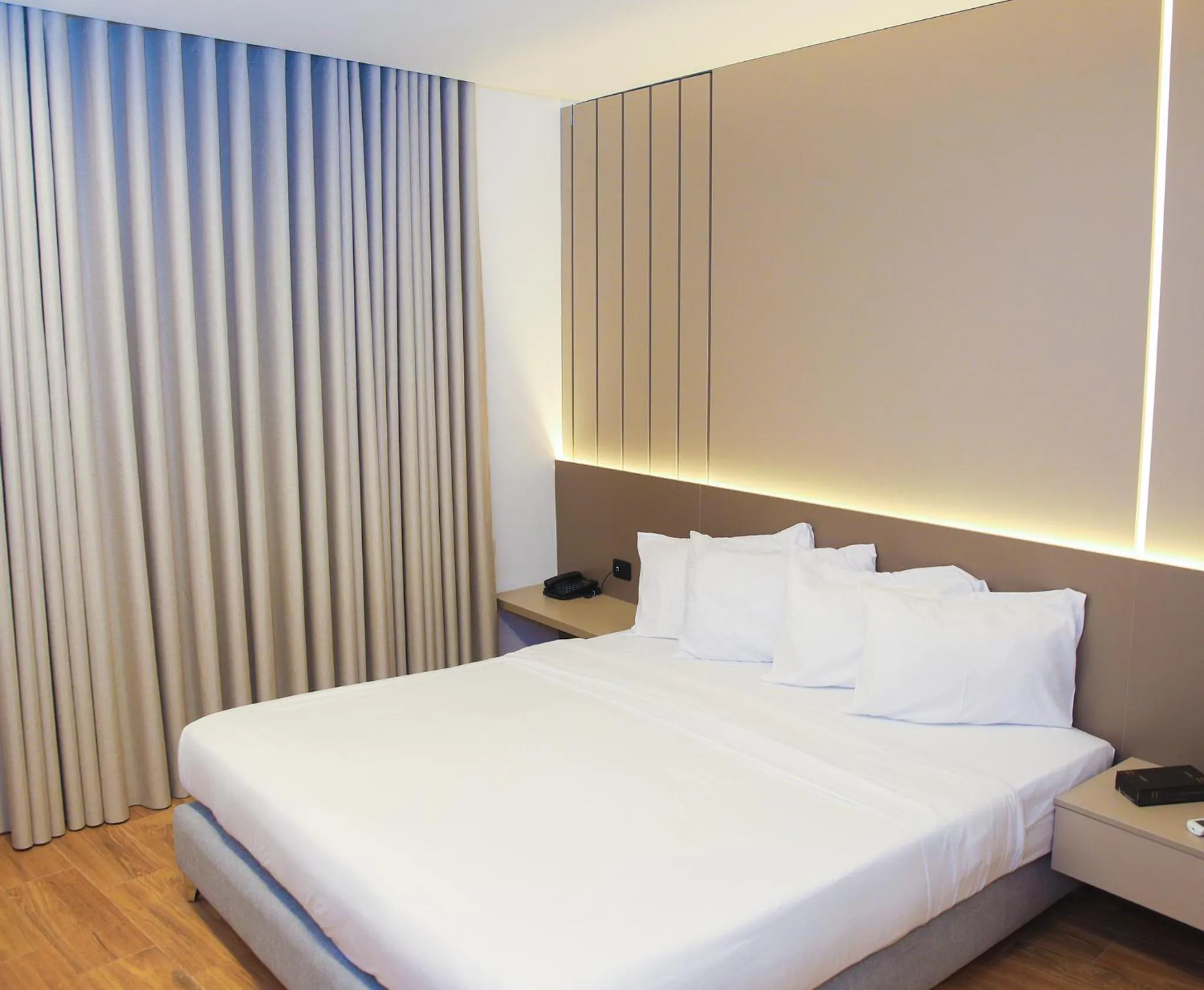 Bed in Spark Plaza Hotel