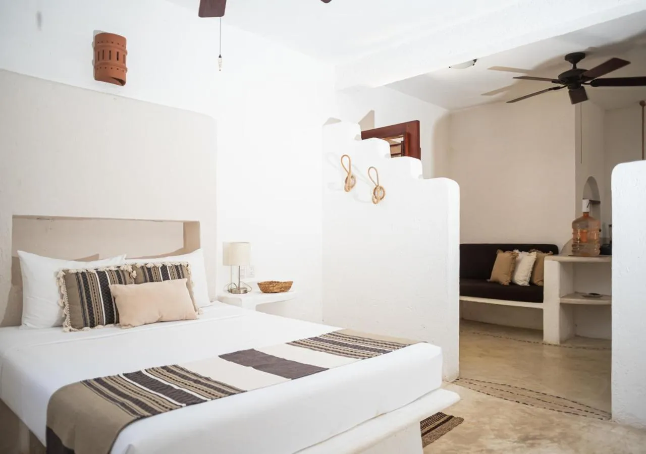 Bed in Villa Los Mangles Boutique Hotel