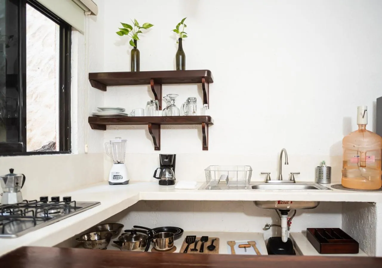 Kitchen or kitchenette in Villa Los Mangles Boutique Hotel