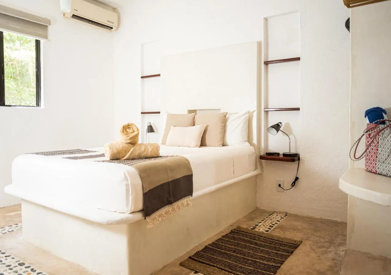 Bed in Villa Los Mangles Boutique Hotel