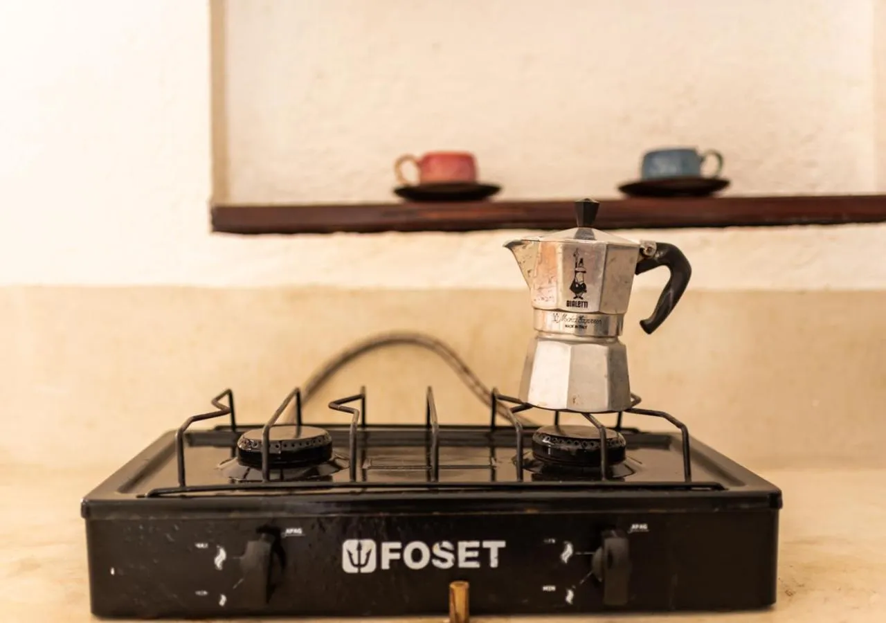 Kitchen or kitchenette in Villa Los Mangles Boutique Hotel