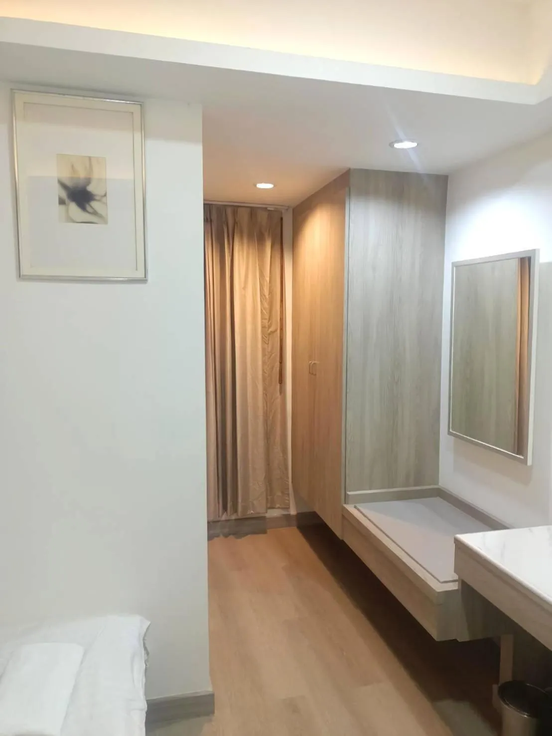 wardrobe in Royal Garden Home Hotel