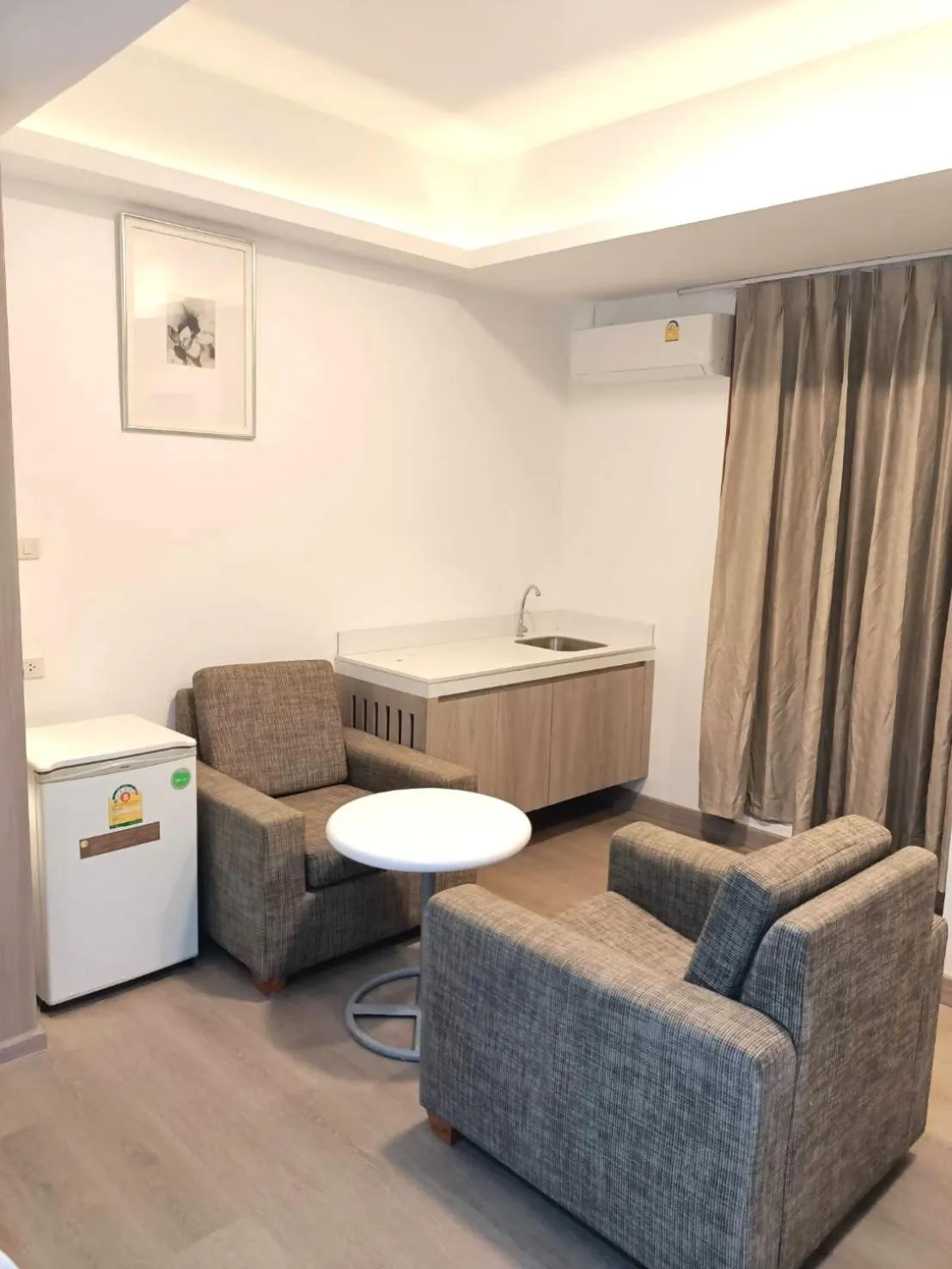 Seating area in Royal Garden Home Hotel