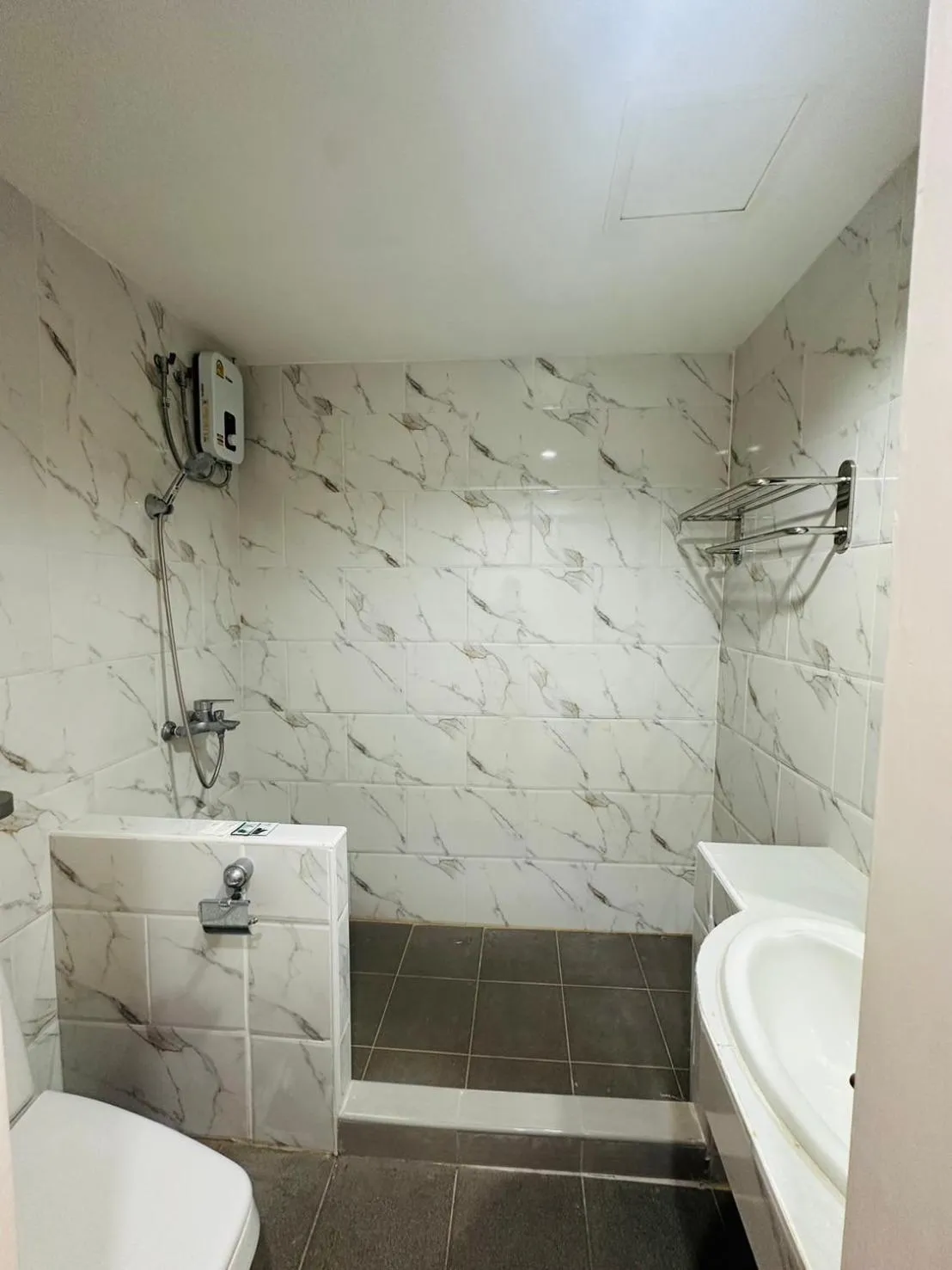 Bathroom in Royal Garden Home Hotel