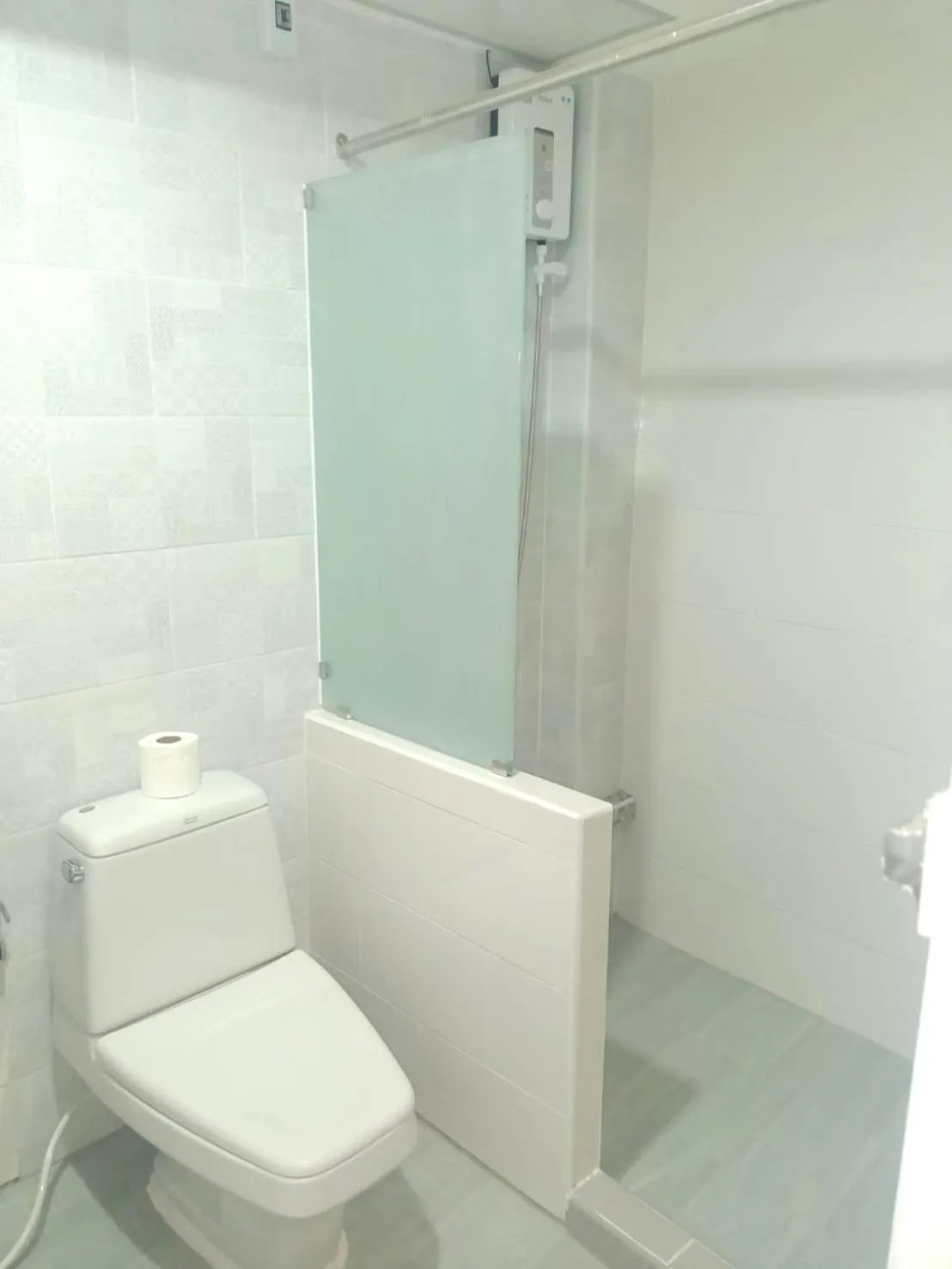 Toilet in Royal Garden Home Hotel