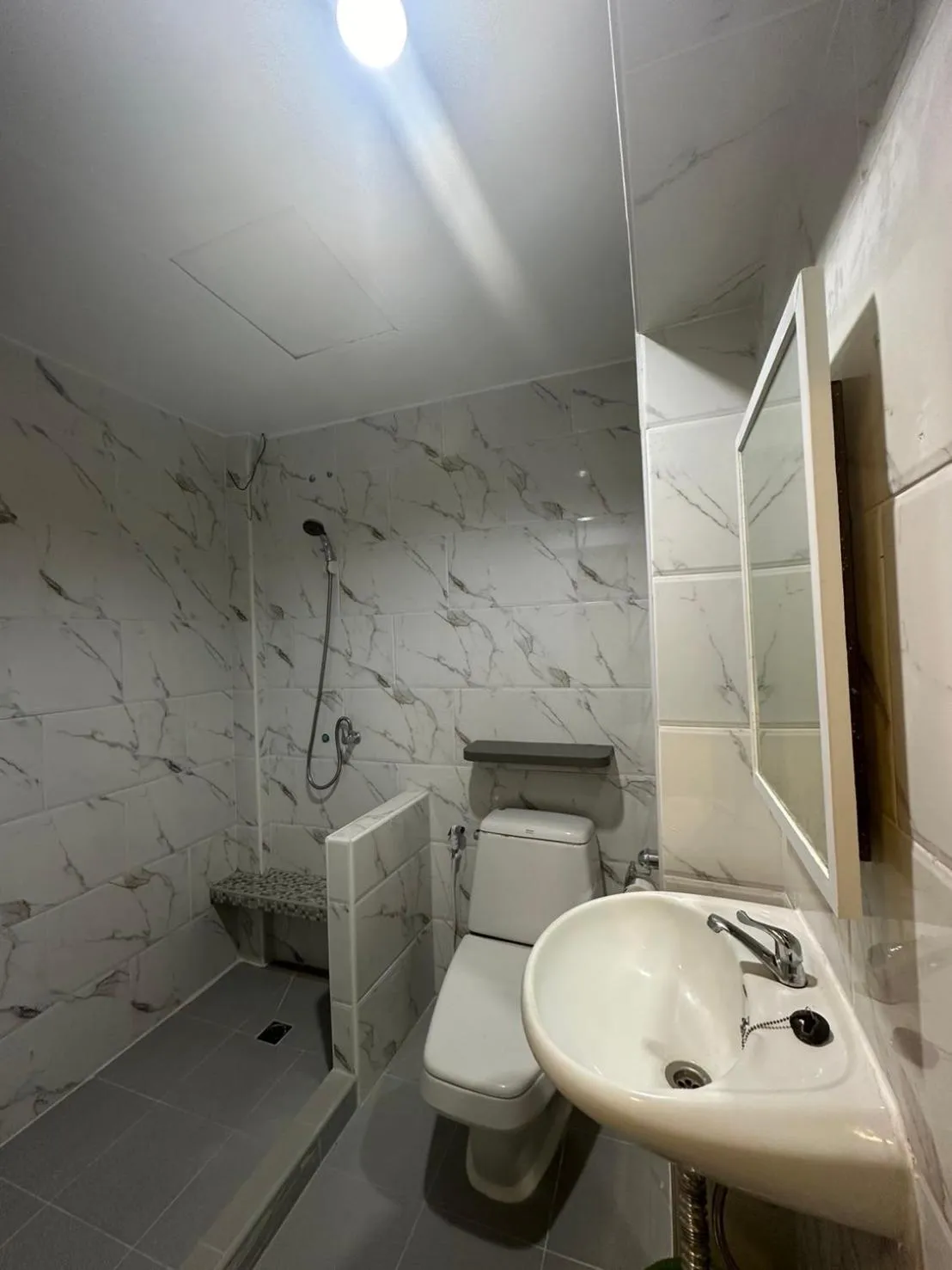 Shower in Royal Garden Home Hotel