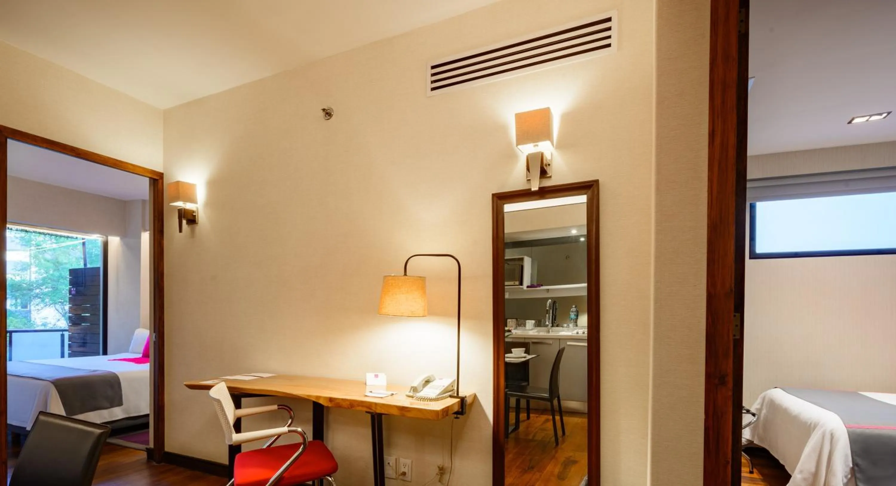 Seating area, Bed in Las Suites Campos Eliseos