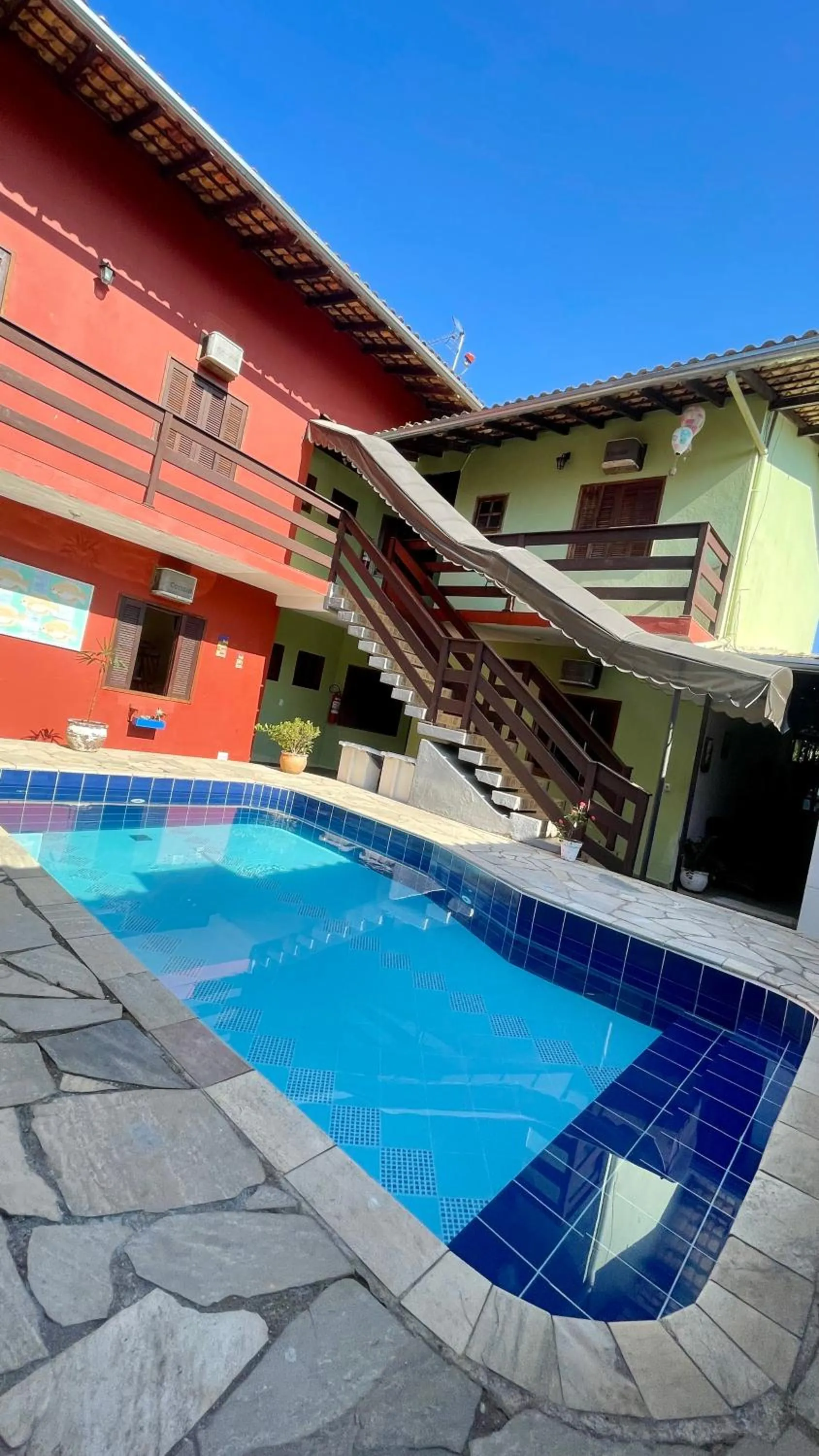 Swimming pool in Pousada Cores Do Mar