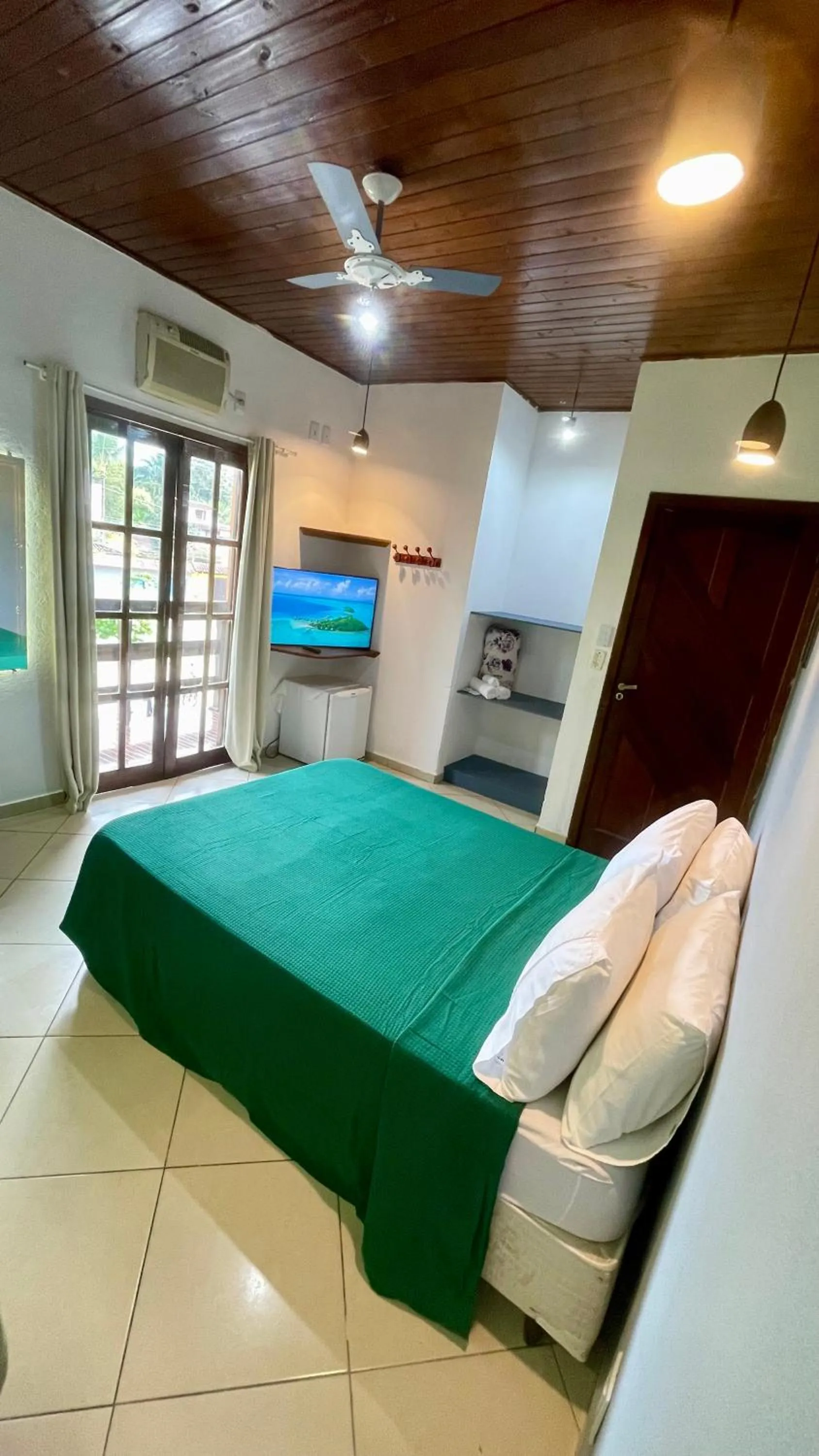 Photo of the whole room, Bed in Pousada Cores Do Mar