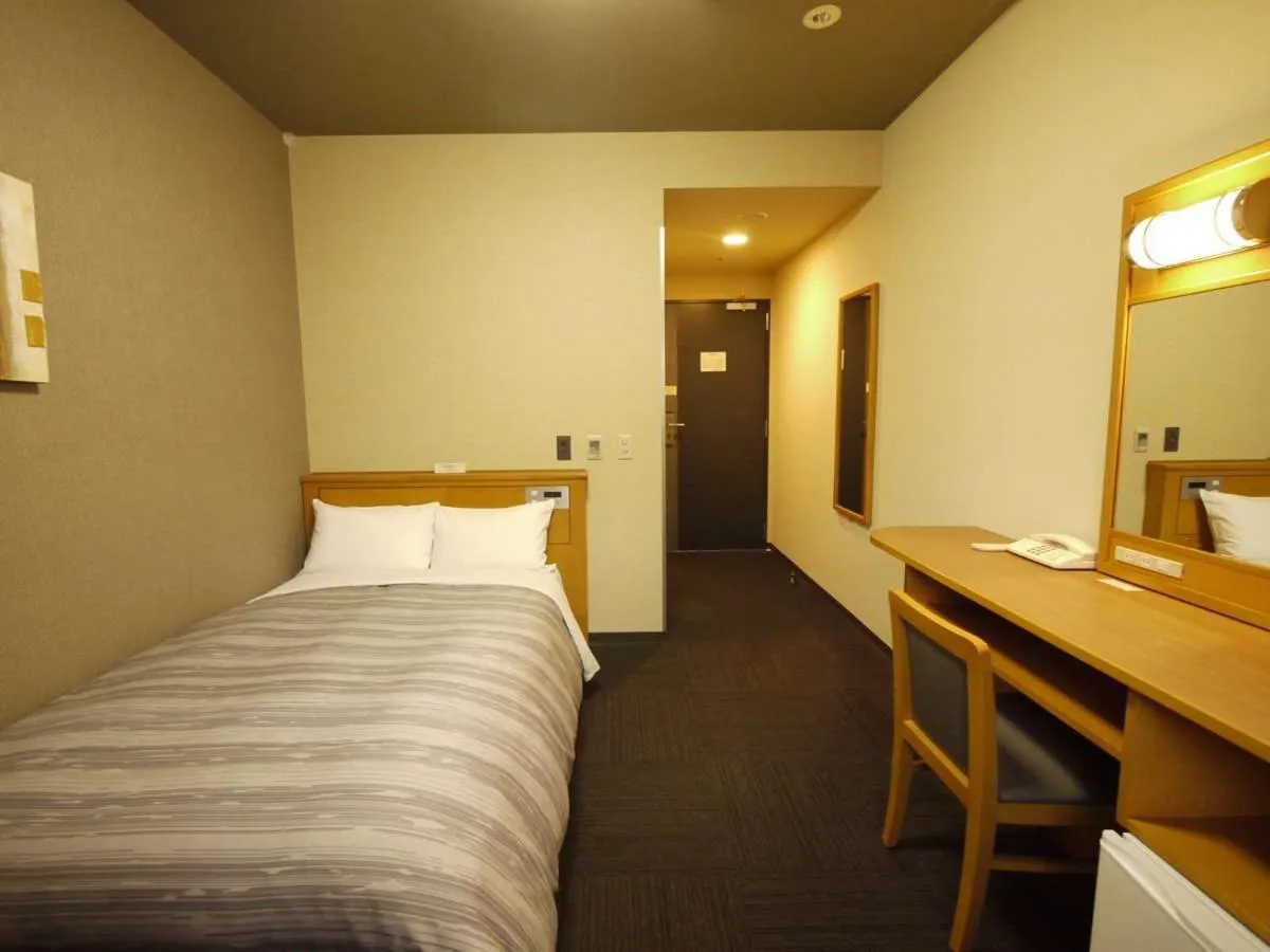 Photo of the whole room, Bed in Hotel Route-Inn Osaka Honmachi