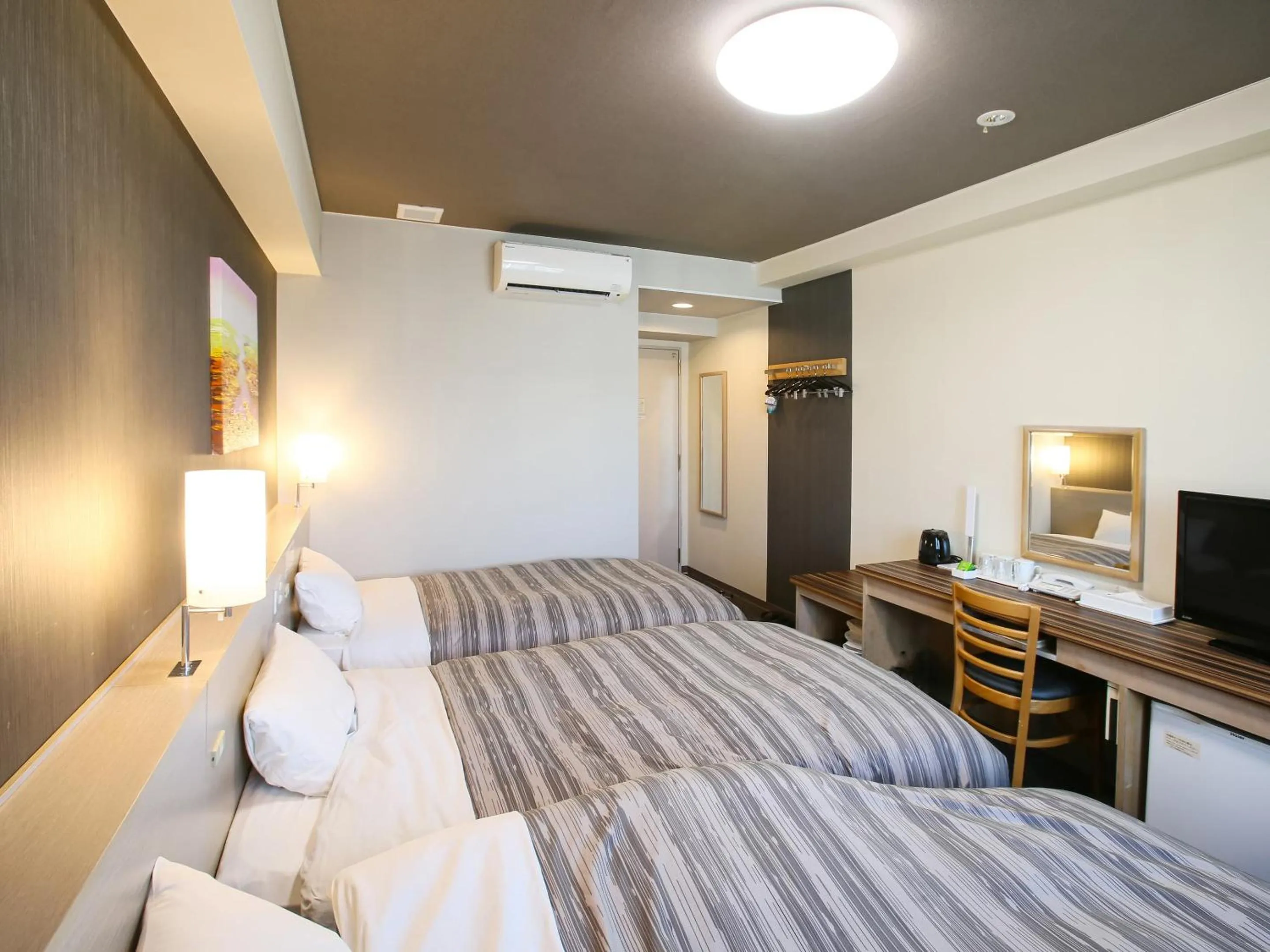 Bed in Route Inn Grantia Ishigaki