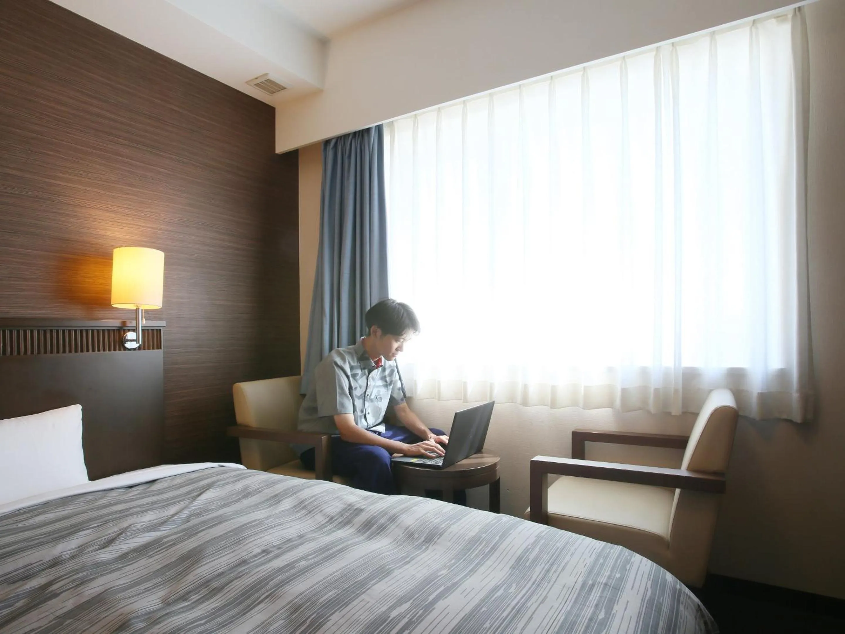 People, Bed in Route Inn Grantia Ishigaki