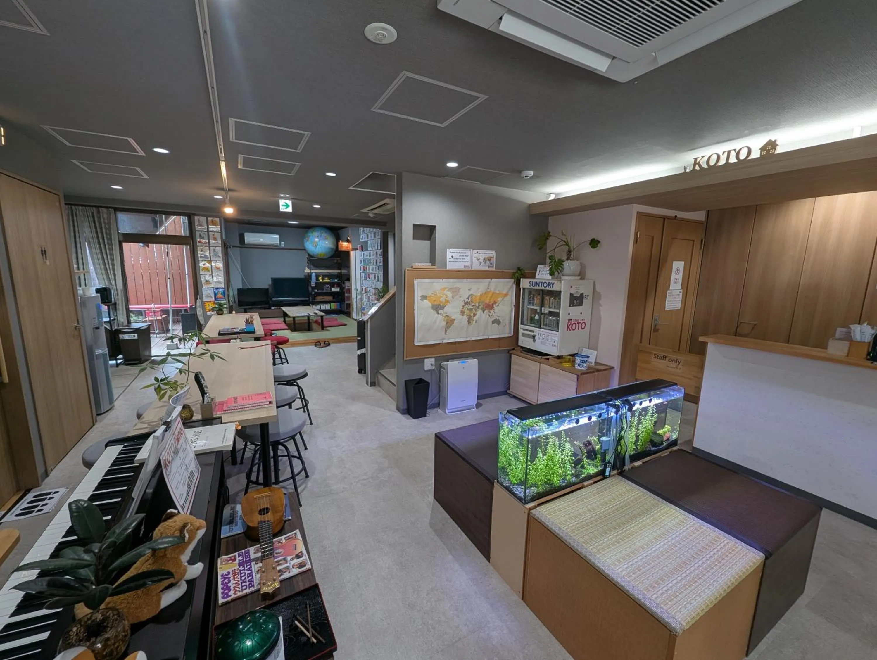 Communal lounge/ TV room in Stay Inn KOTO