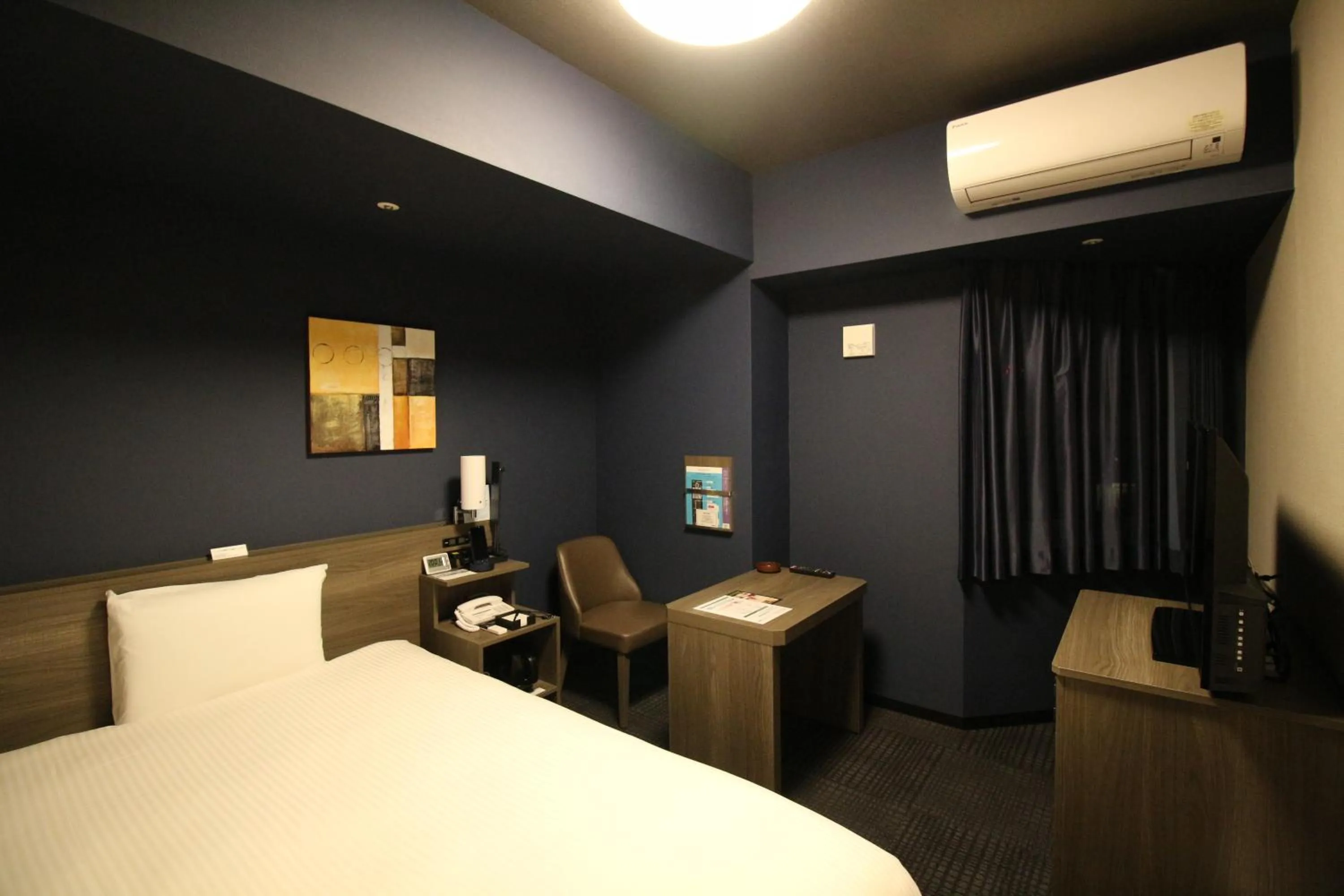 Bed in Hotel Route-Inn Grand Tokyo Toyocho