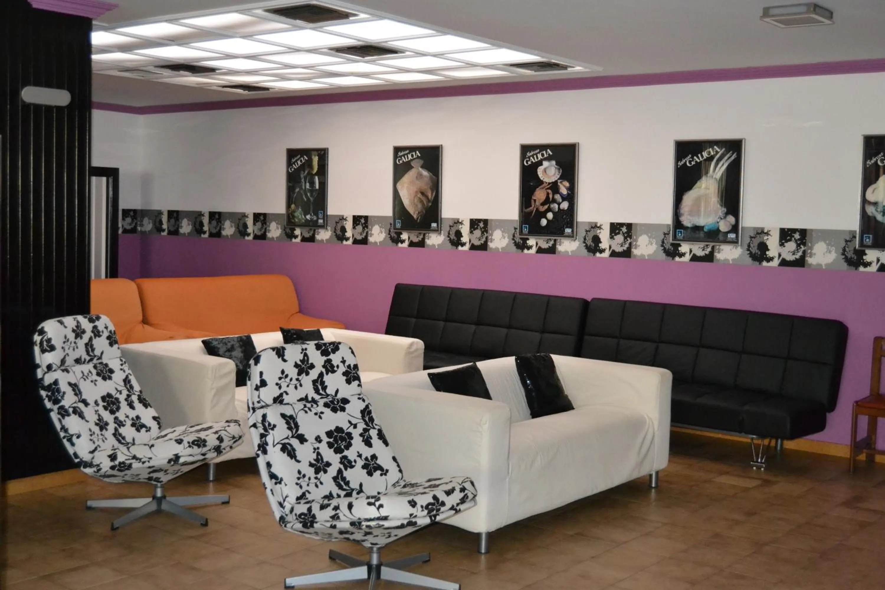 Communal lounge/ TV room in Hotel Nuevo Cachalote