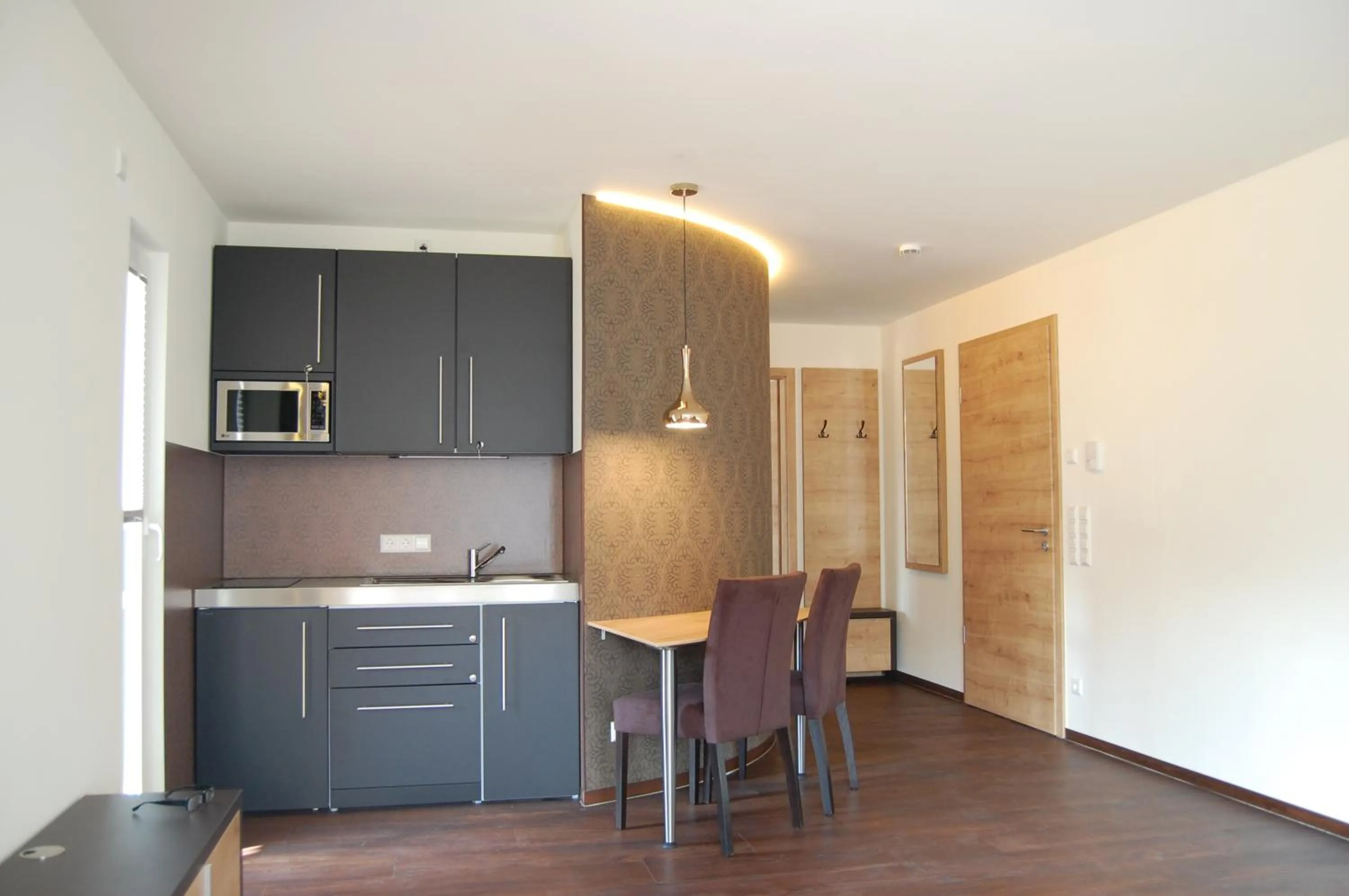 Kitchen or kitchenette in Waldhotel Rainau