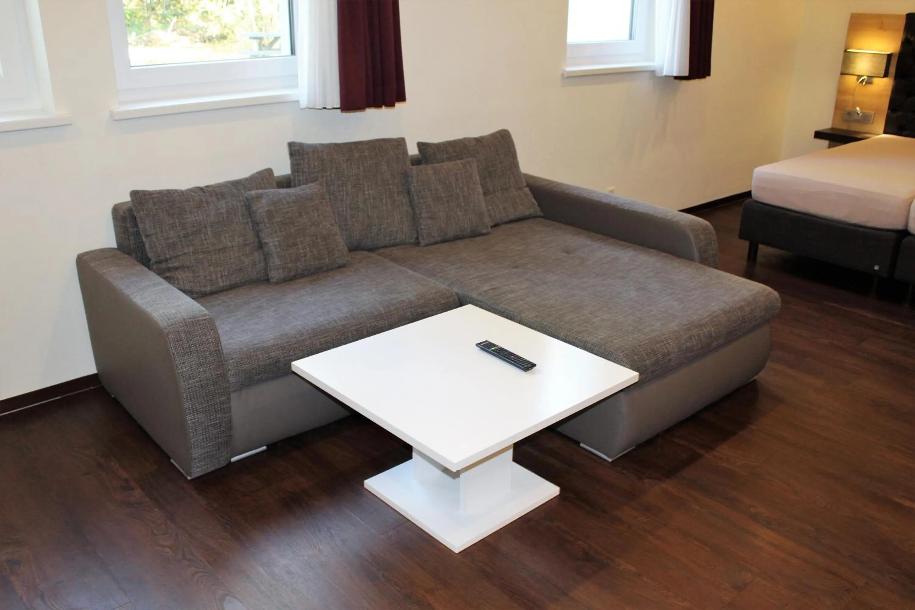 Living room, Bed in Waldhotel Rainau