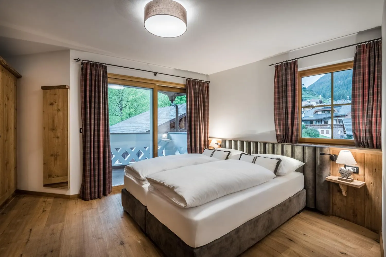 Bed in Alpenhotel Plaza