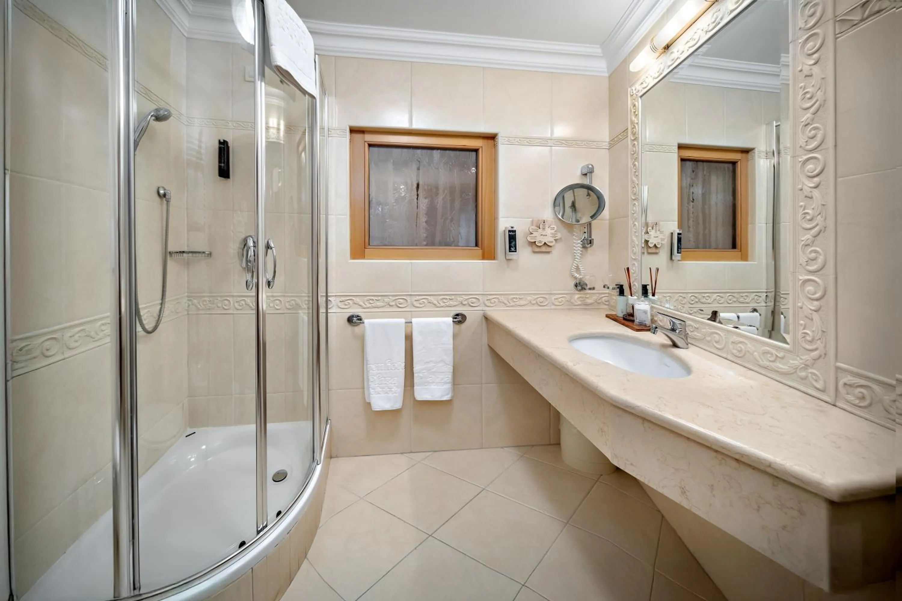 Bathroom in Alpenhotel Plaza