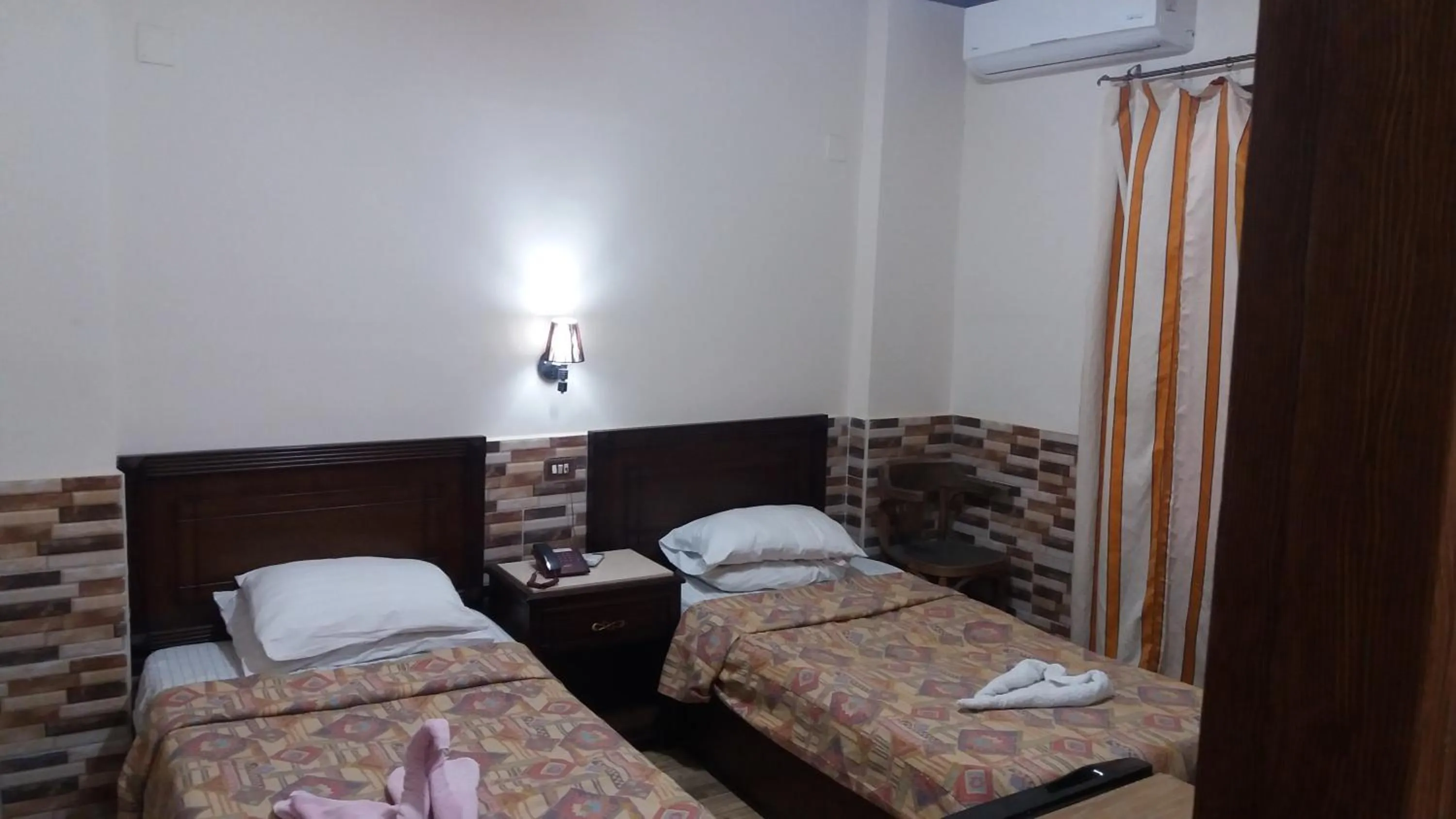 Bed in Ciao Hotel Cairo