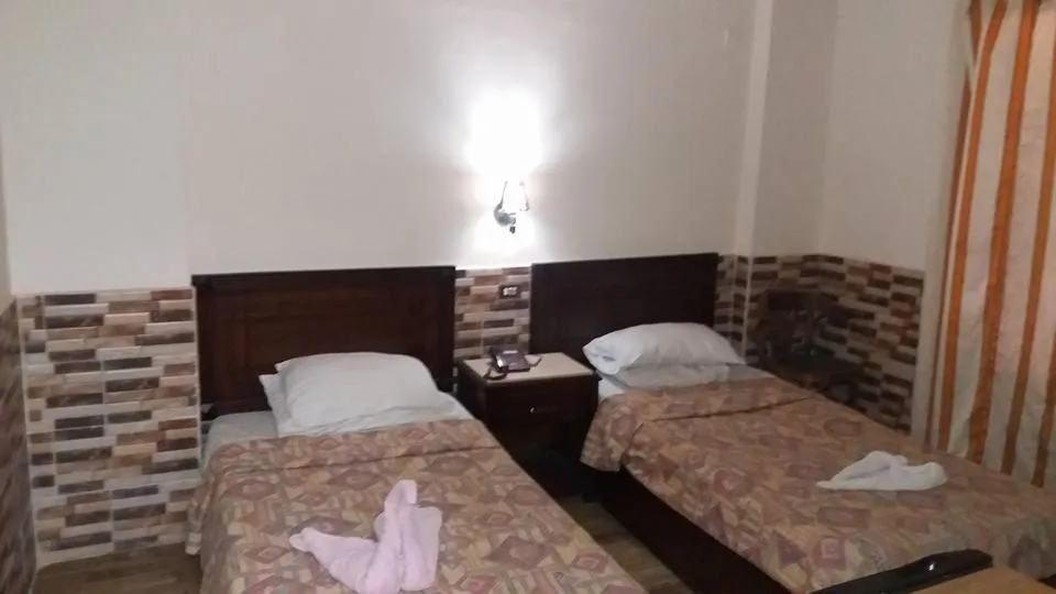 Bed in Ciao Hotel Cairo