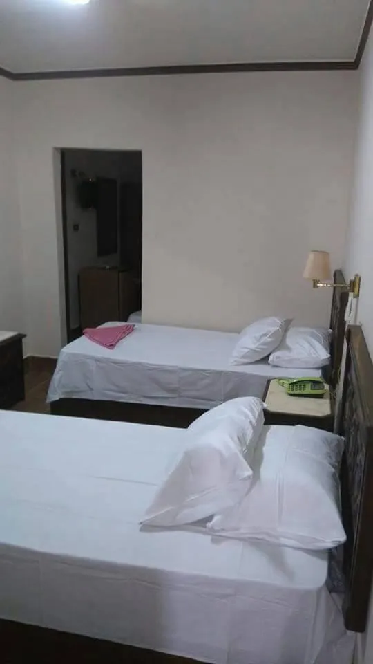 Bed in Ciao Hotel Cairo