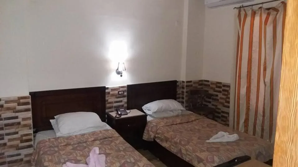 Bed in Ciao Hotel Cairo