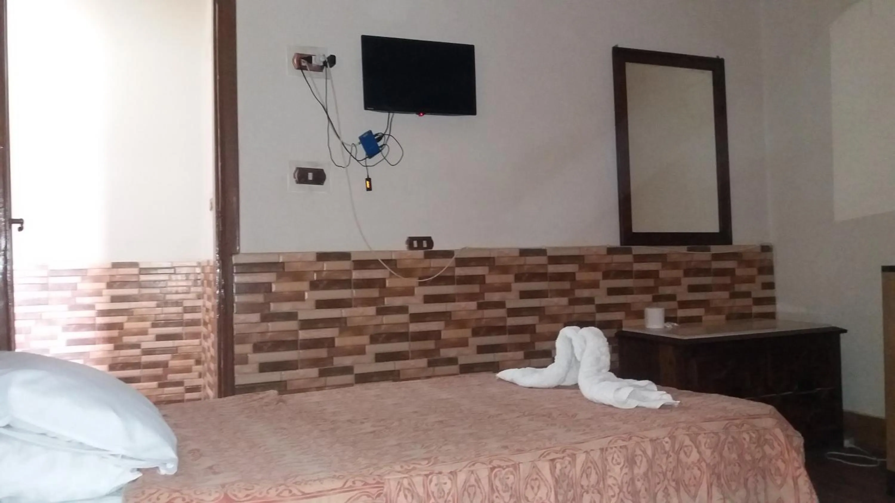 Bed in Ciao Hotel Cairo