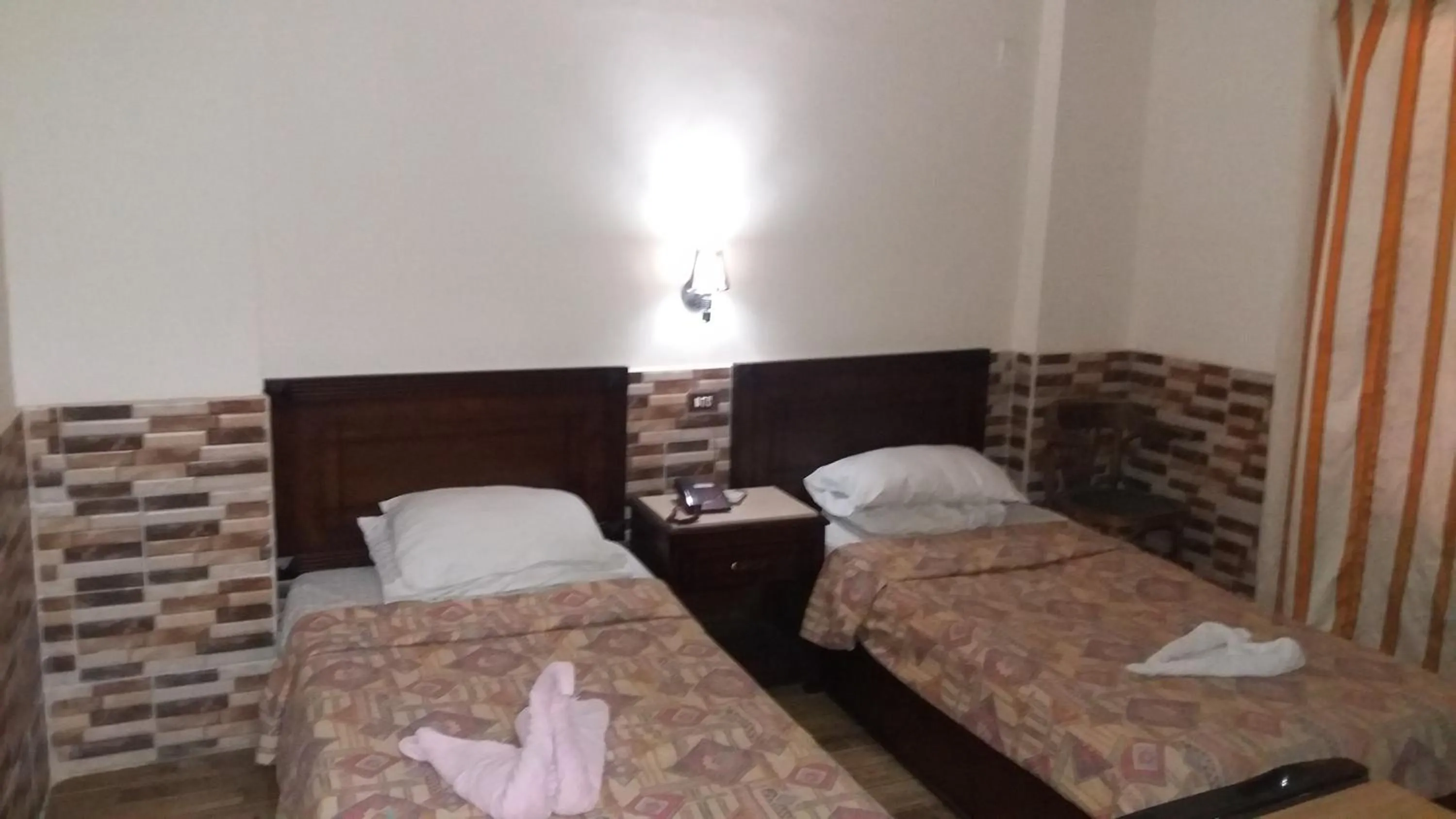 Bed in Ciao Hotel Cairo