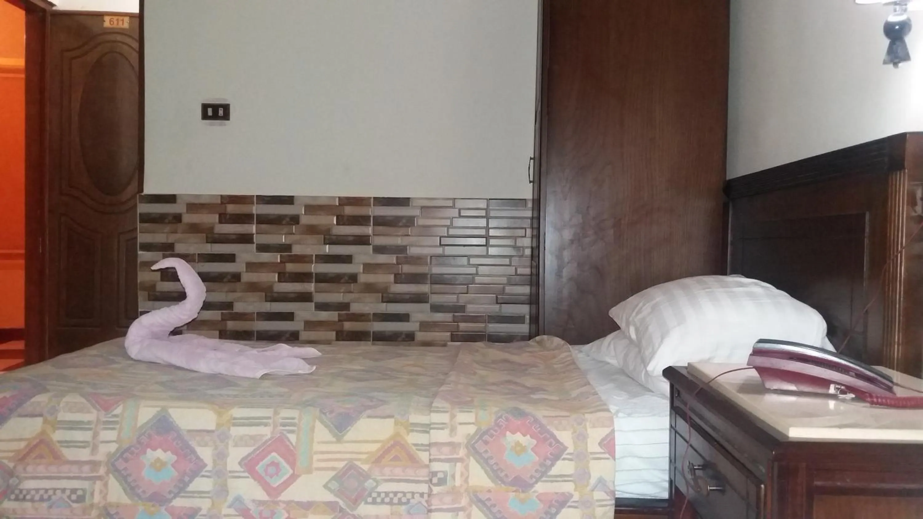 Bed in Ciao Hotel Cairo