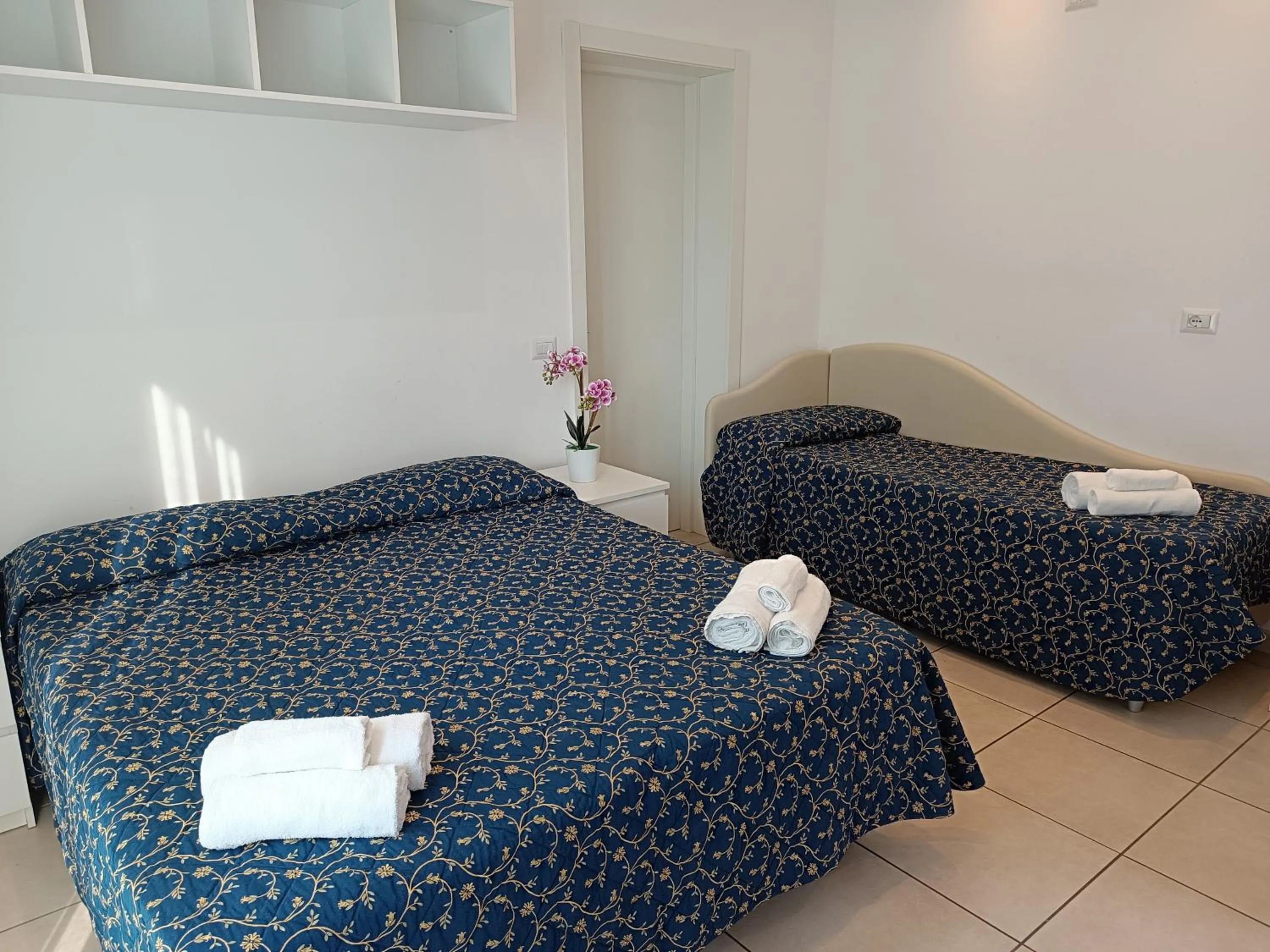 Bed in Hotel Queen Mary