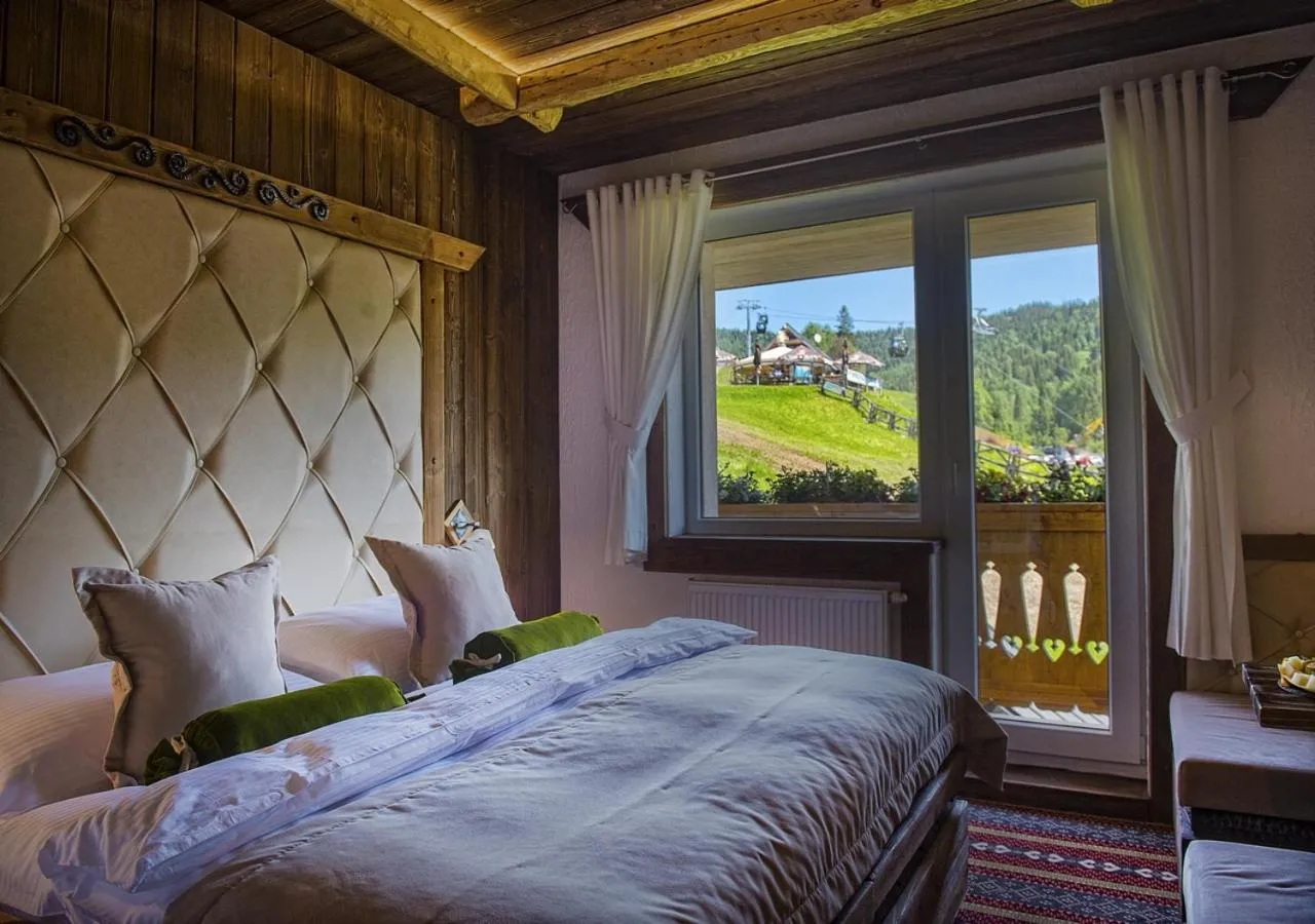 Balcony/Terrace, Bed in Grand Hotel**** Bachledka Strachan