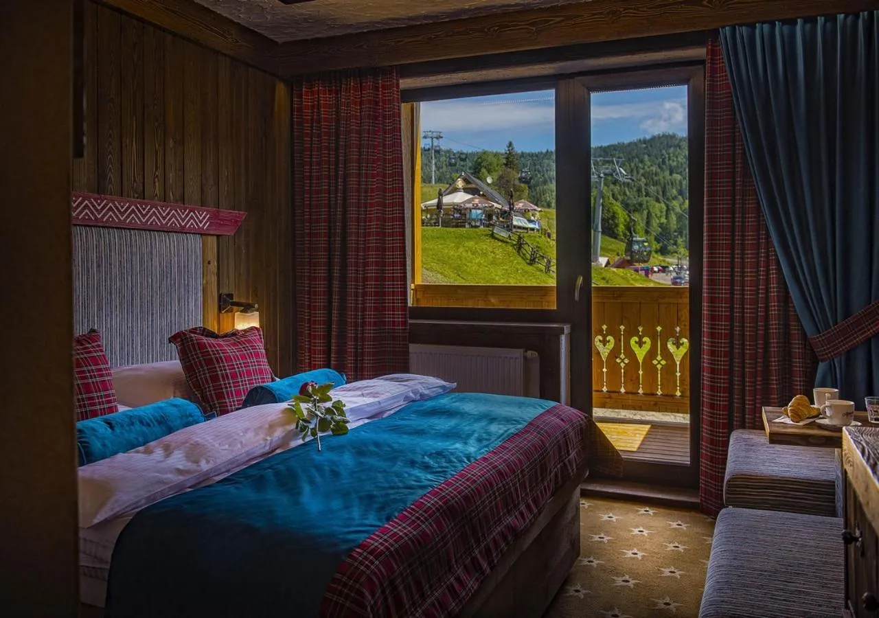 Balcony/Terrace, Bed in Grand Hotel**** Bachledka Strachan